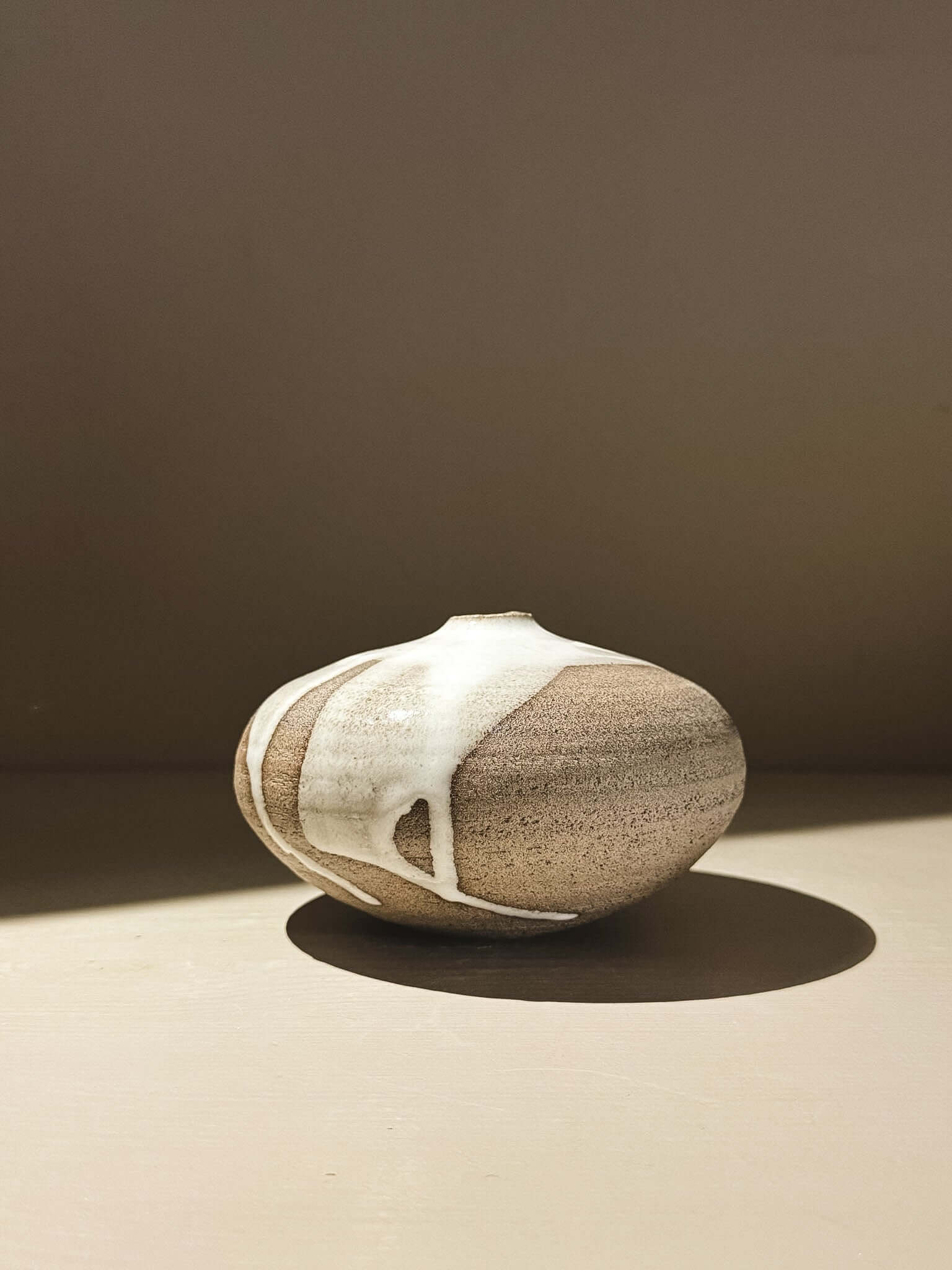 Orb Vase –Yuki Ash #02 featuring a unique glaze and soft, rounded form on a neutral background.