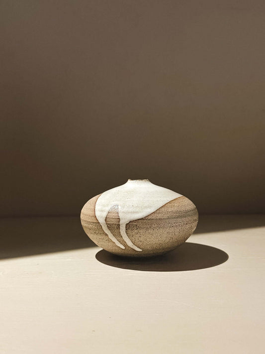 Orb Vase – Yuki Ash #05 with unique glaze patterns and rounded sculptural form.