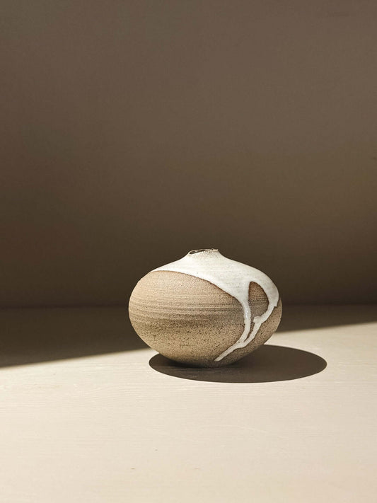 Orb Vase – Yuki Ash #06 featuring natural glaze movement and a soft, sculptural form.