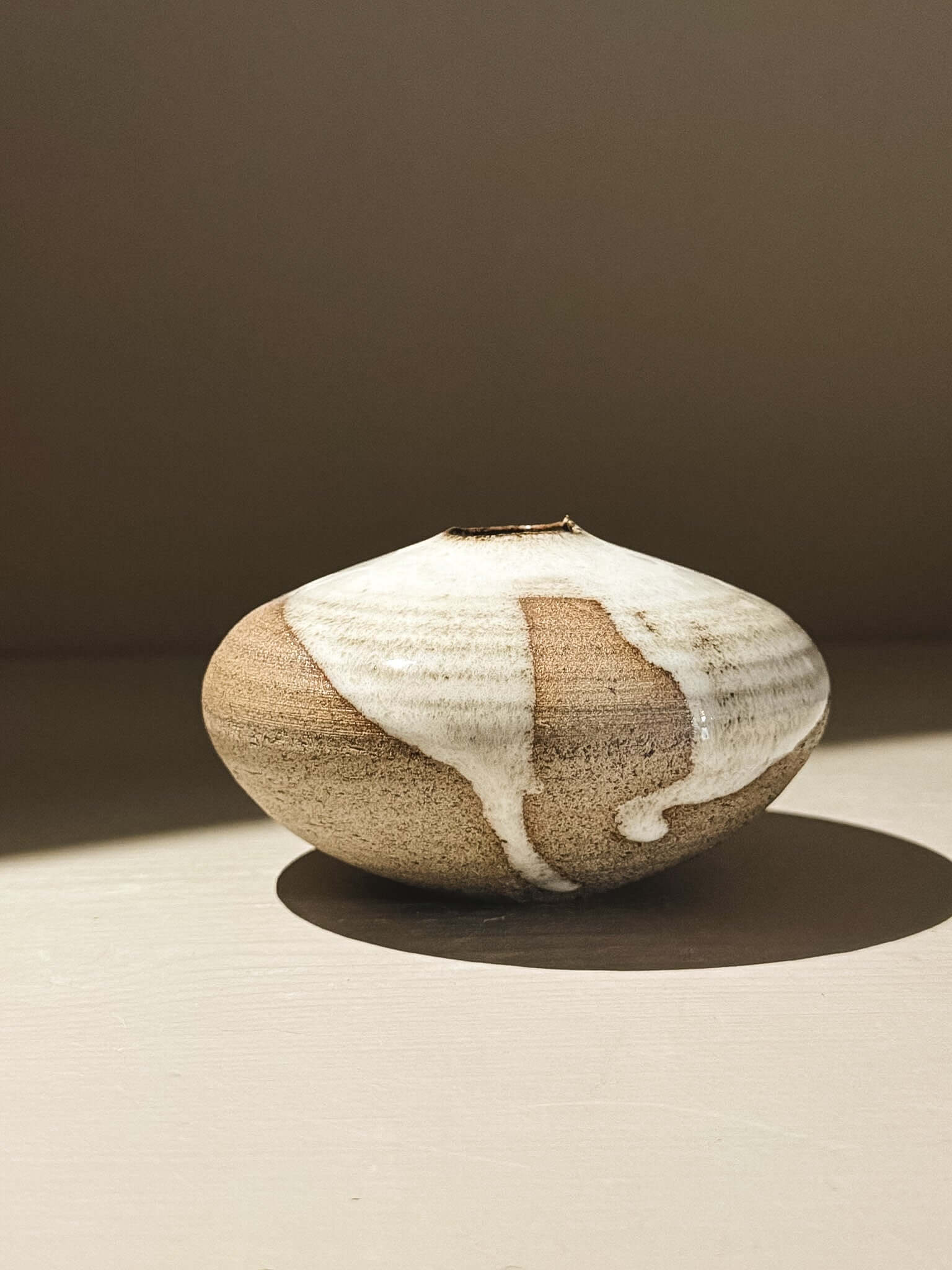 Orb Vase – Yuki Ash #07, unique japanese handmade ceramic orb vase with natural glaze patterns.