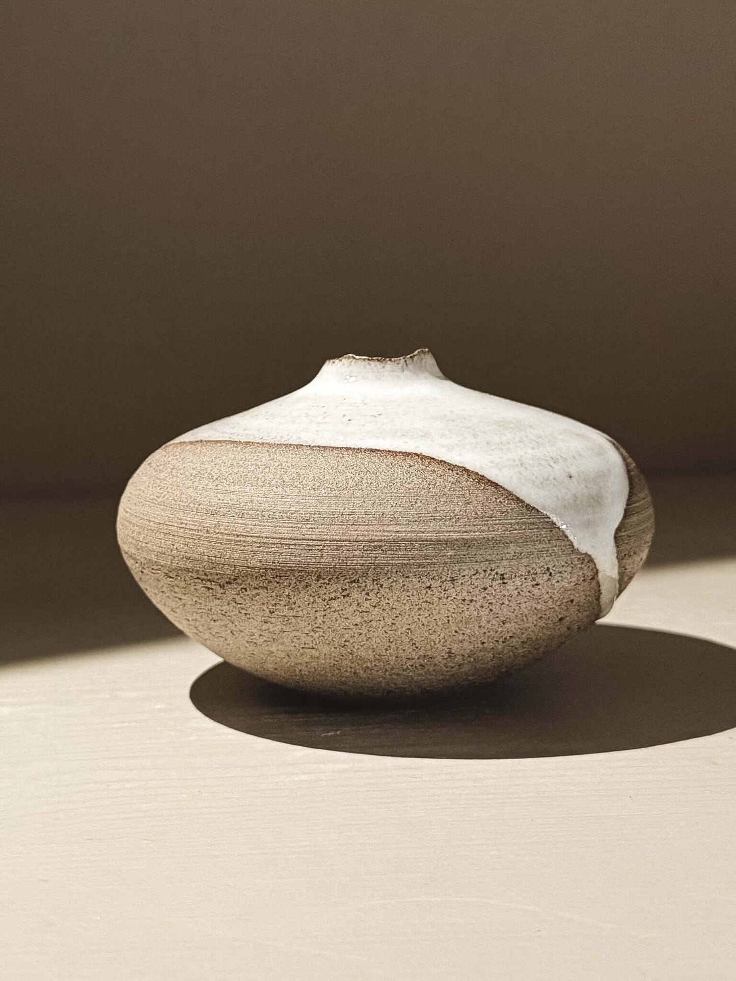 Orb Vase – Yuki Ash #10 - Japanese handmade ceramic orb vase with unique glaze patterns.