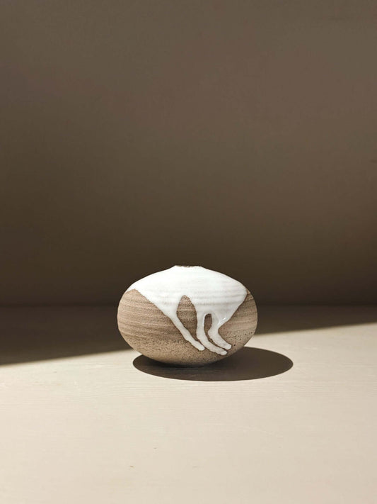 Orb Vase – Yuki Ash #11, a japanese handmade ceramic orb vase with unique glaze patterns.