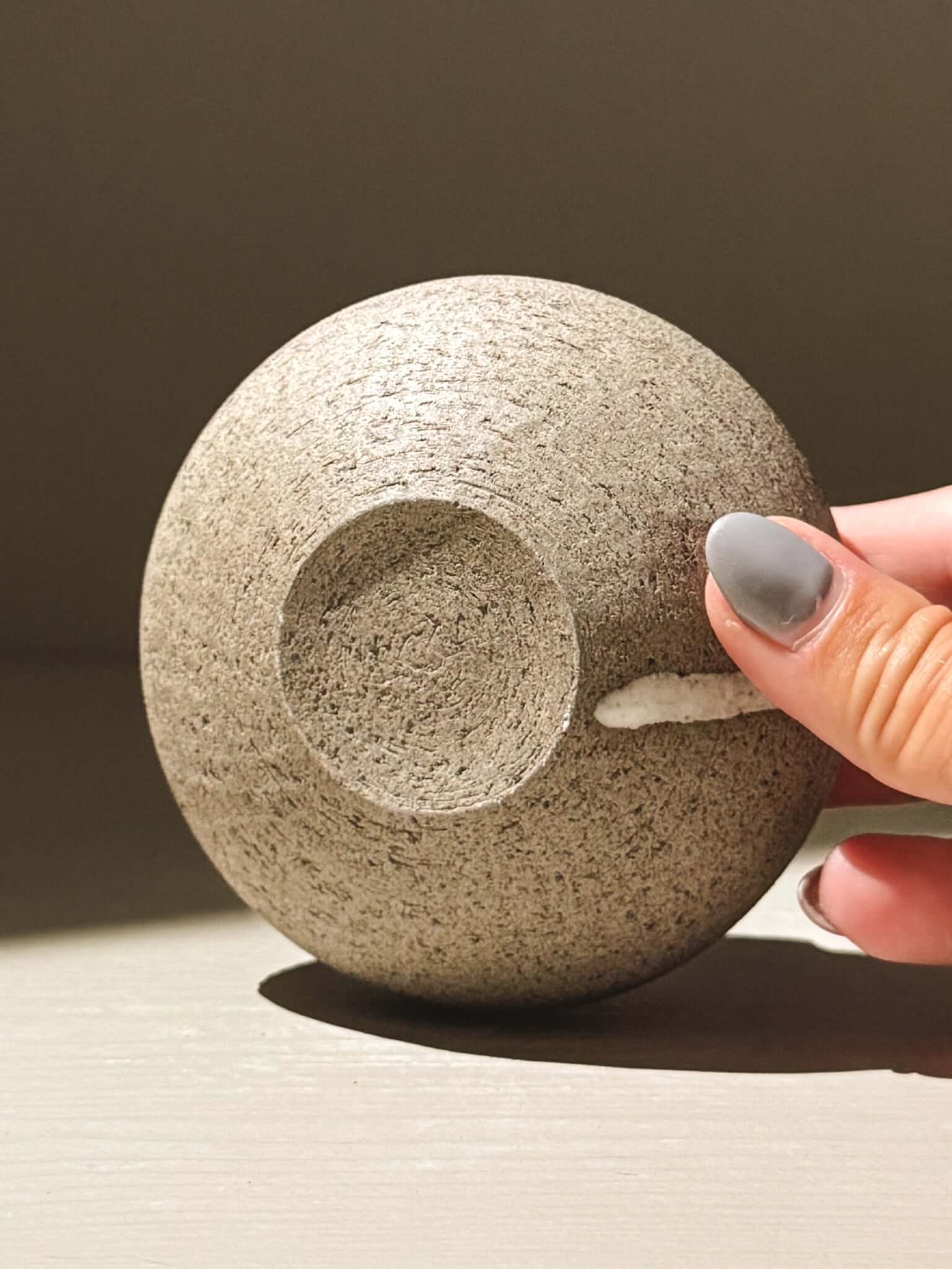 Orb Vase – Yuki Ash #13, handmade ceramic japanese orb vase with a unique, textured surface and small opening.