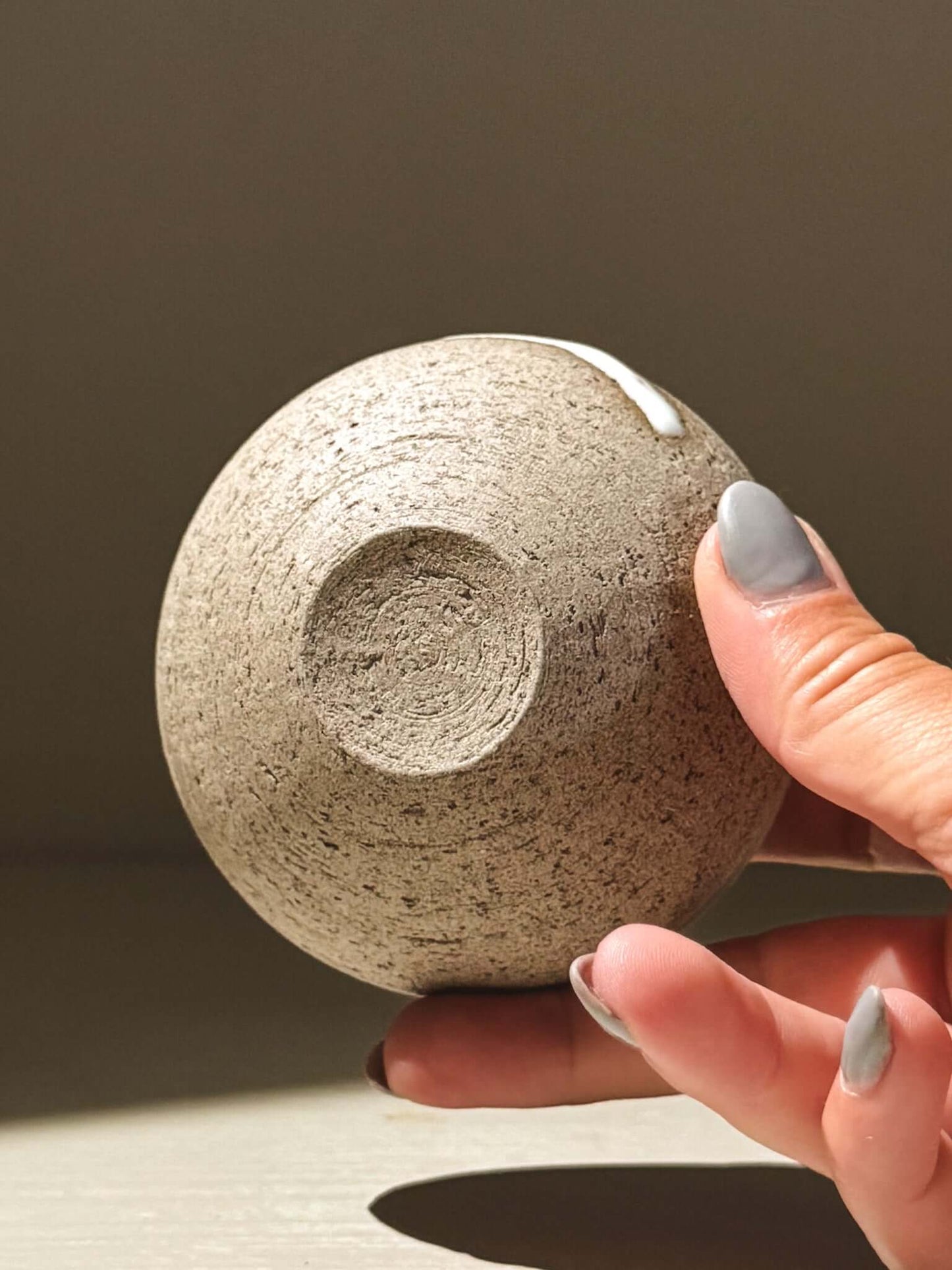 Handmade ceramic Japanese orb vase – Yuki Ash #15, showcasing unique glaze and texture details.