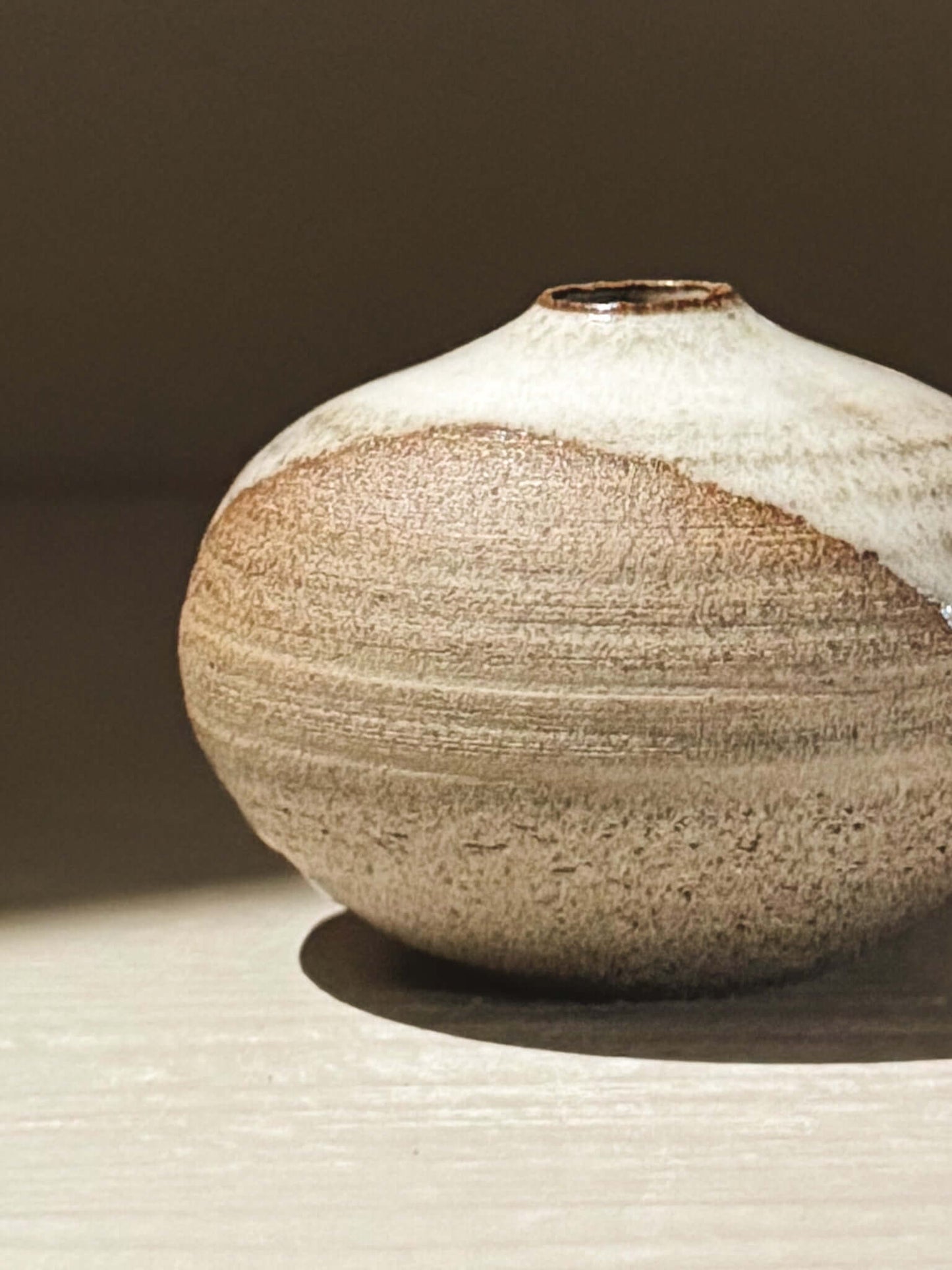 Handmade ceramic Japanese orb vase - Orb Vase – Yuki Ash #16 featuring unique glaze patterns.