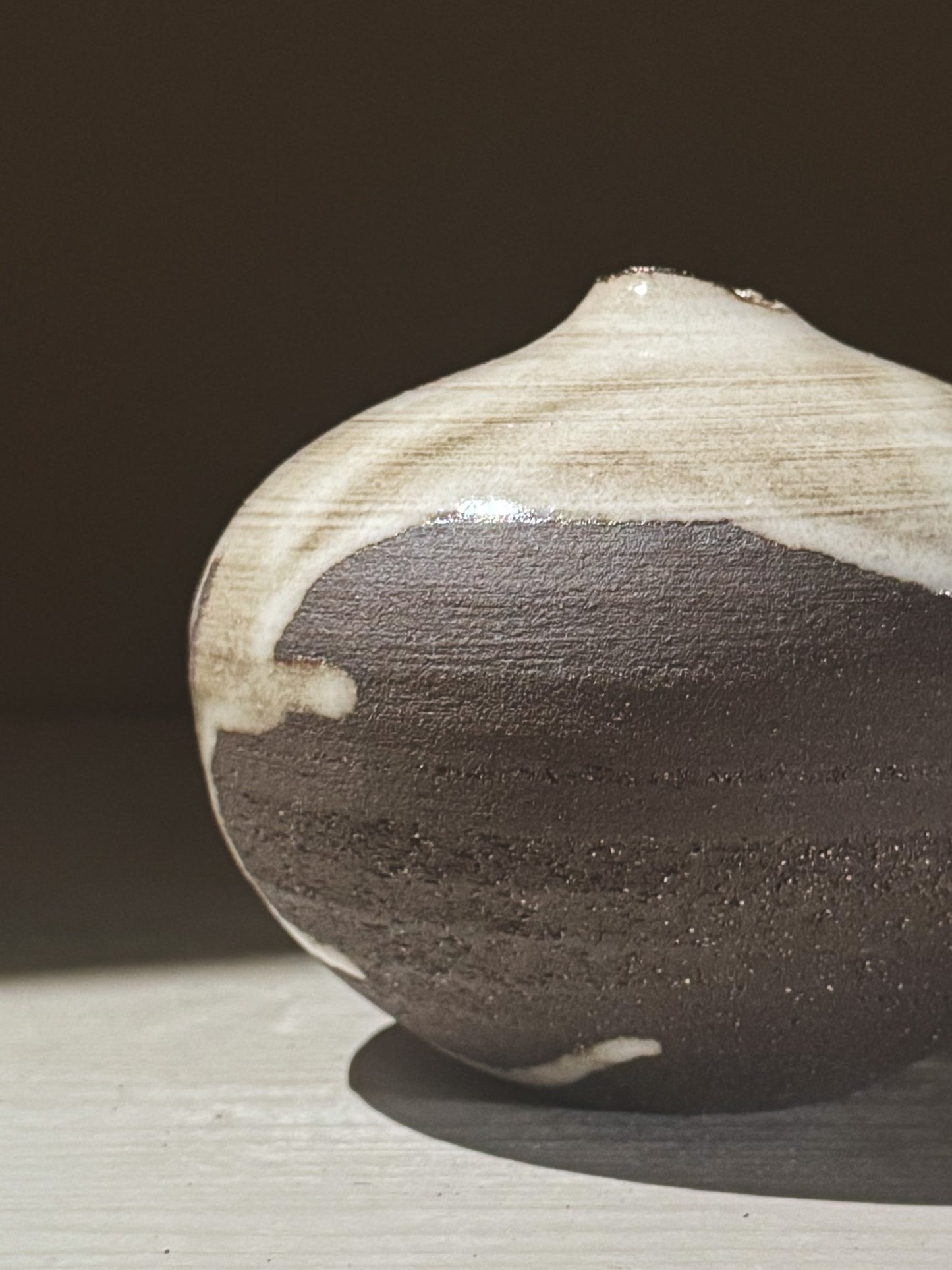 Orb Vase – Yuki Black #07 featuring a unique glaze with organic patterns and a soft spherical form.