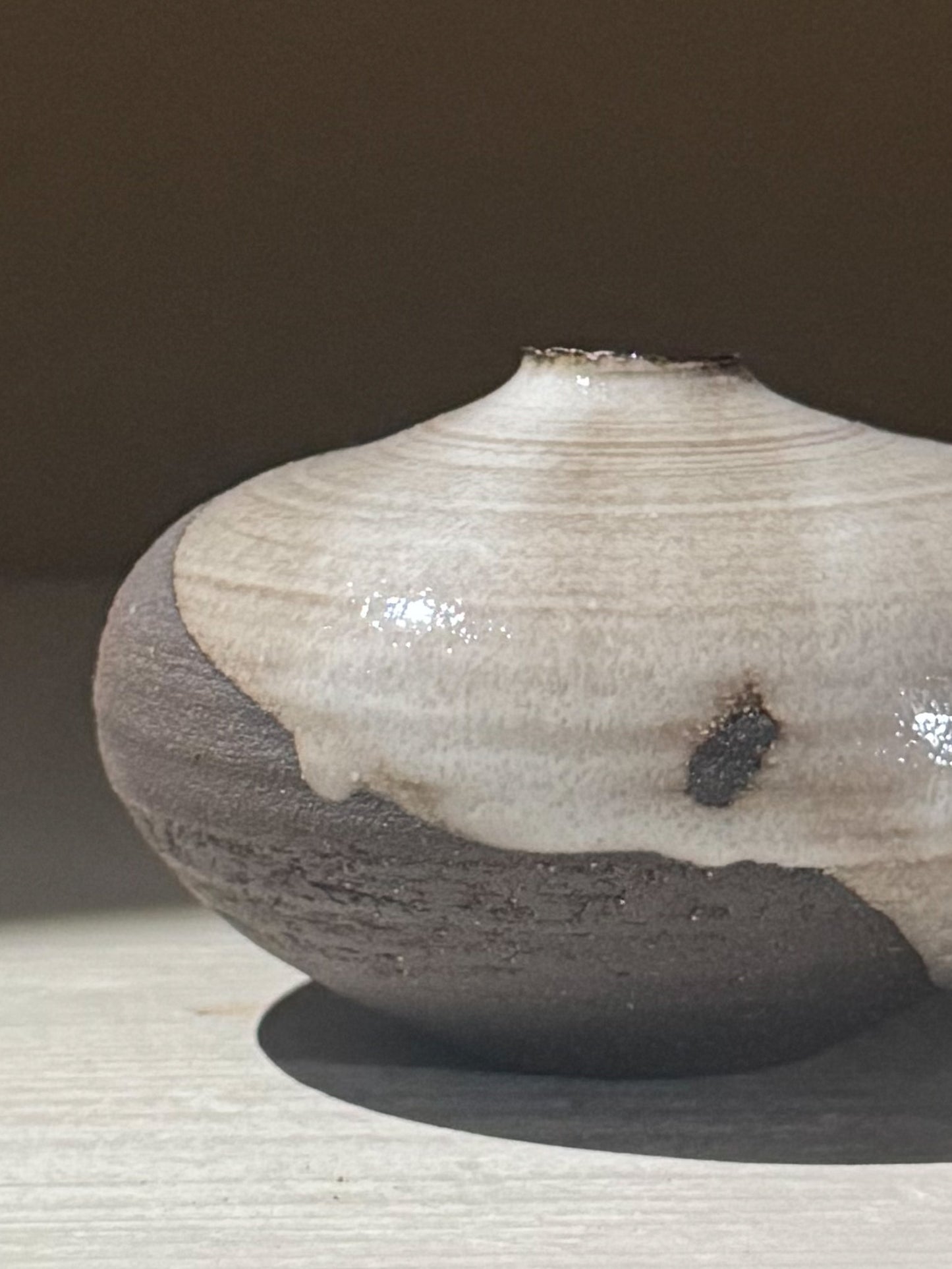 Orb Vase – Yuki Black #13 featuring a unique glaze pattern and soft spherical design.