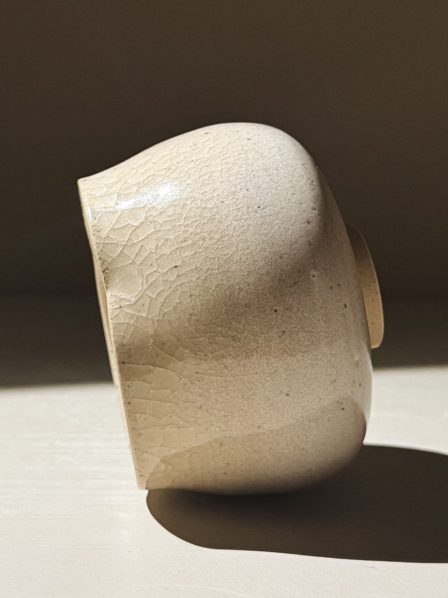 Yunomi Cup - Kannyū Series  #10 side view showcasing its crackle glaze and elegant design.