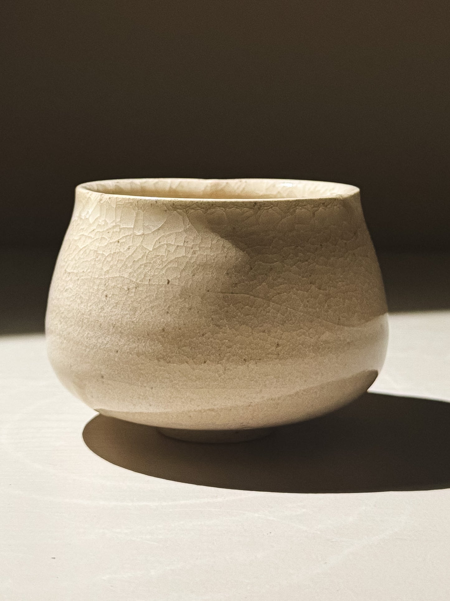 Yunomi Cup - Kannyū Series  #12 with a transparent crackle glaze showcasing fine lines and a softly flowing rim.