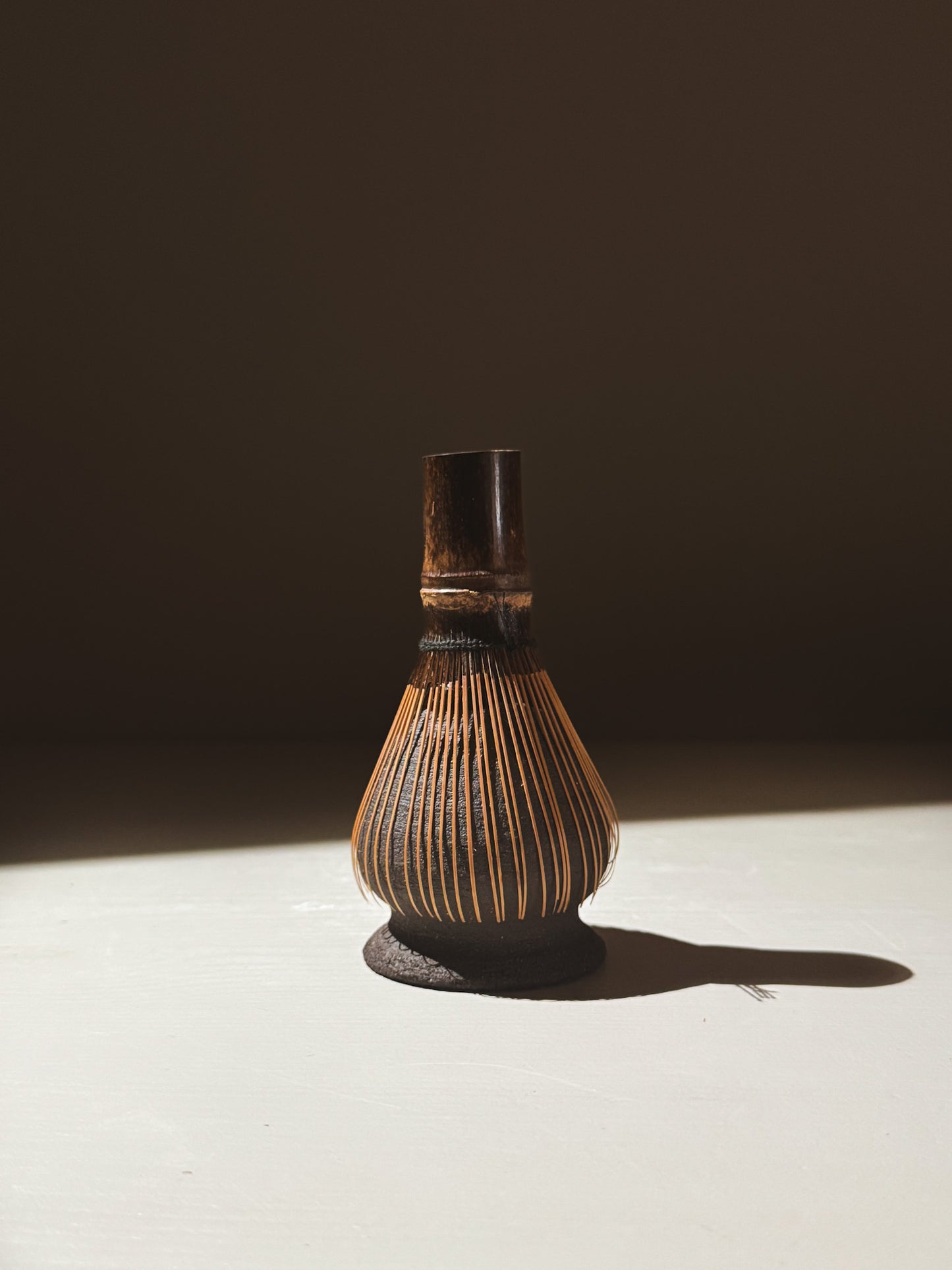 Whisk Holder  - Kuro, handcrafted from dark clay with glossy glaze and earthy tones, perfect for matcha preparation.