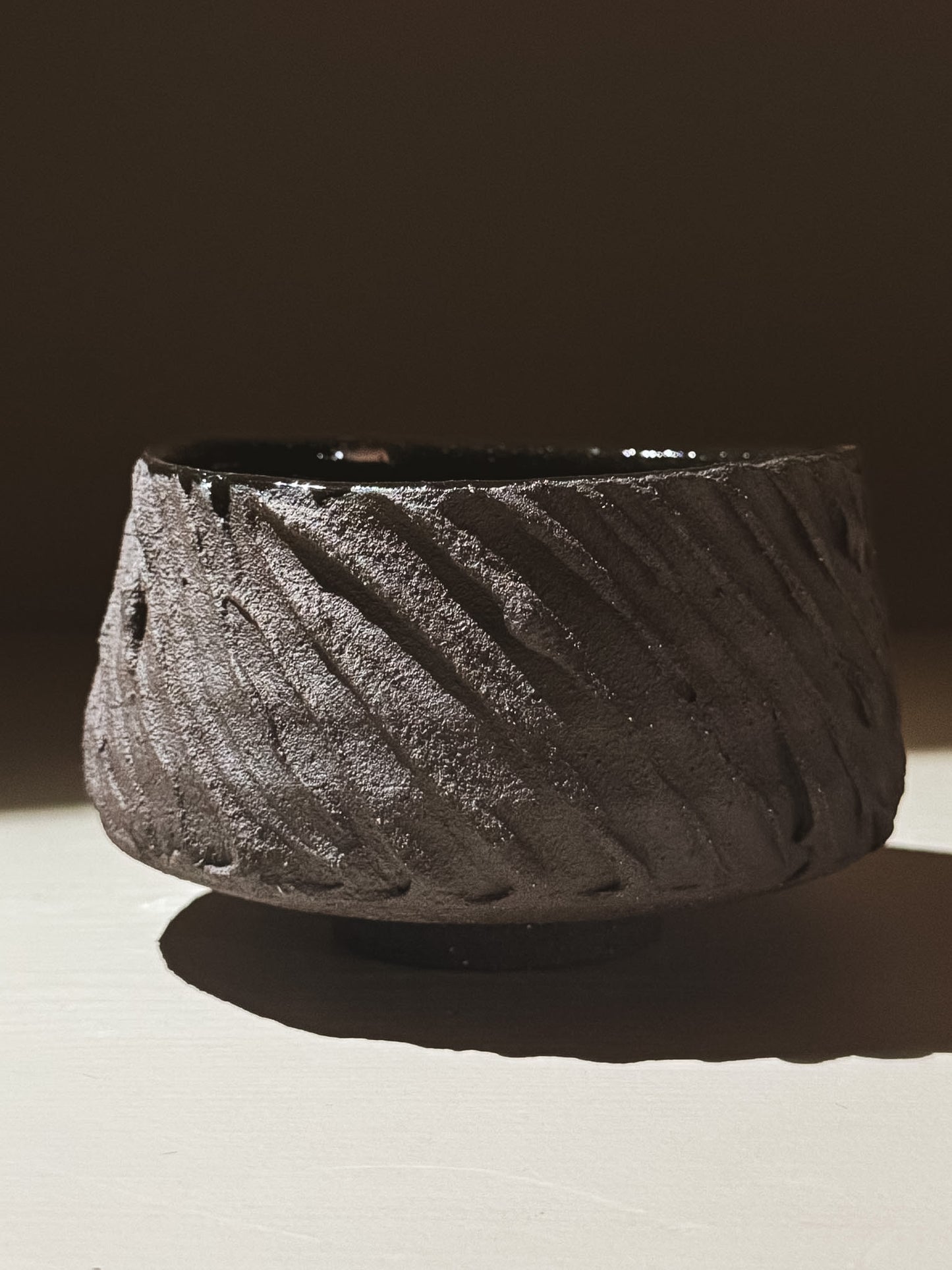 Kuro Matcha Bowl #01 with textured dark brown exterior and glossy dark glaze interior.