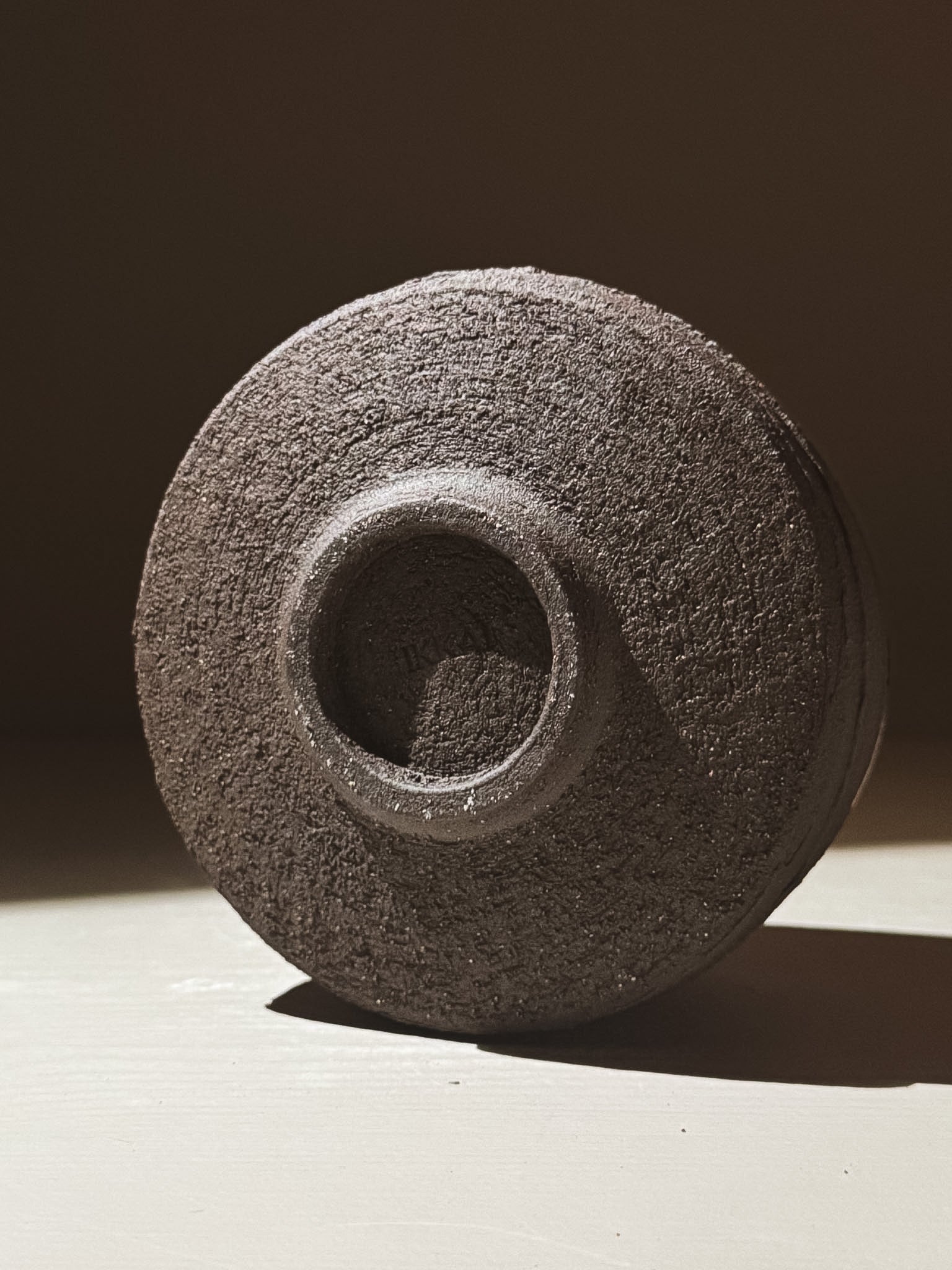 Kuro Matcha Bowl #10 featuring a textured dark brown exterior and smooth glossy interior.