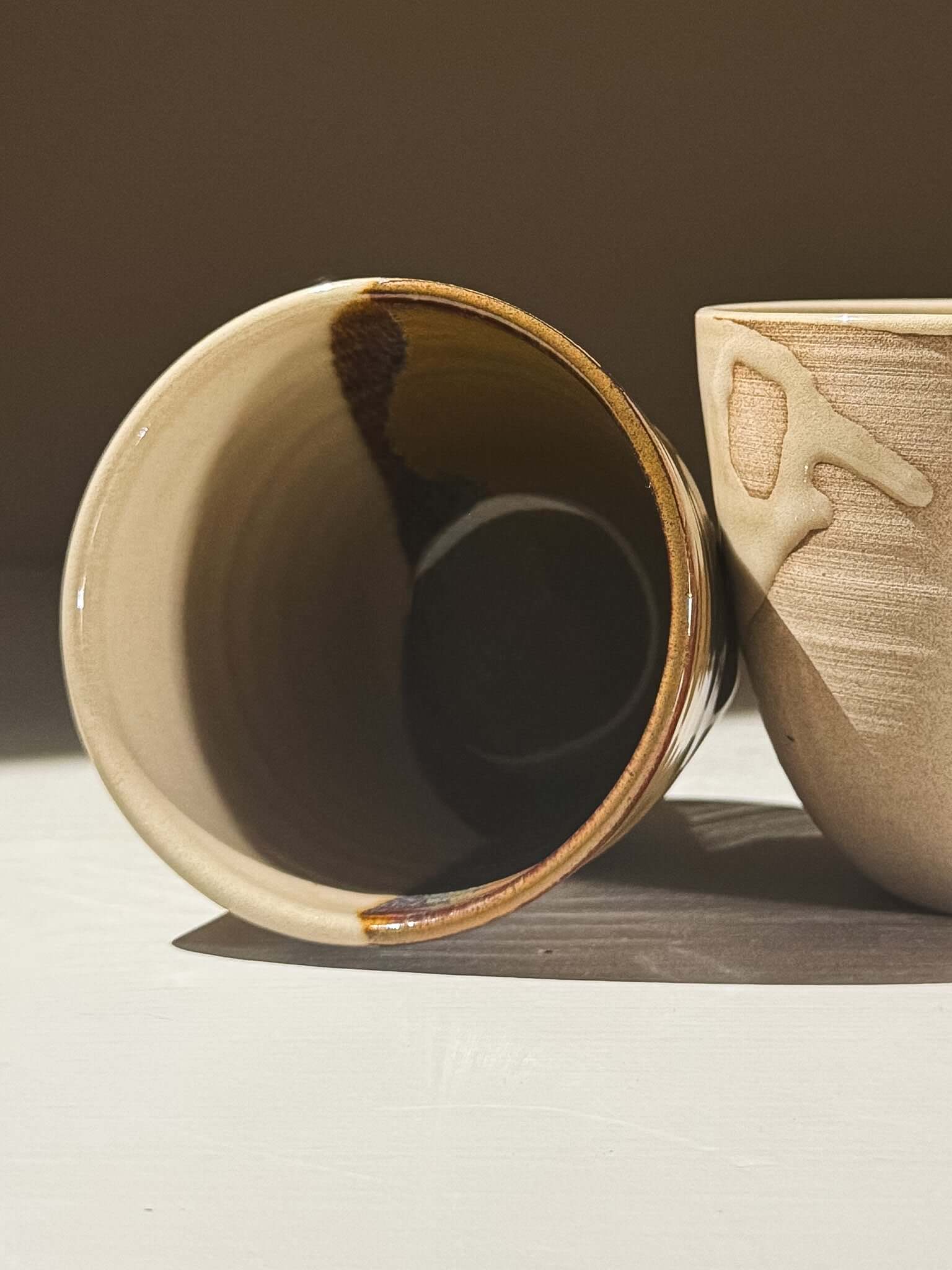 Stackable Latte Cups - Inyo showcasing unique glazes and design, highlighting their handmade quality and soft form.
