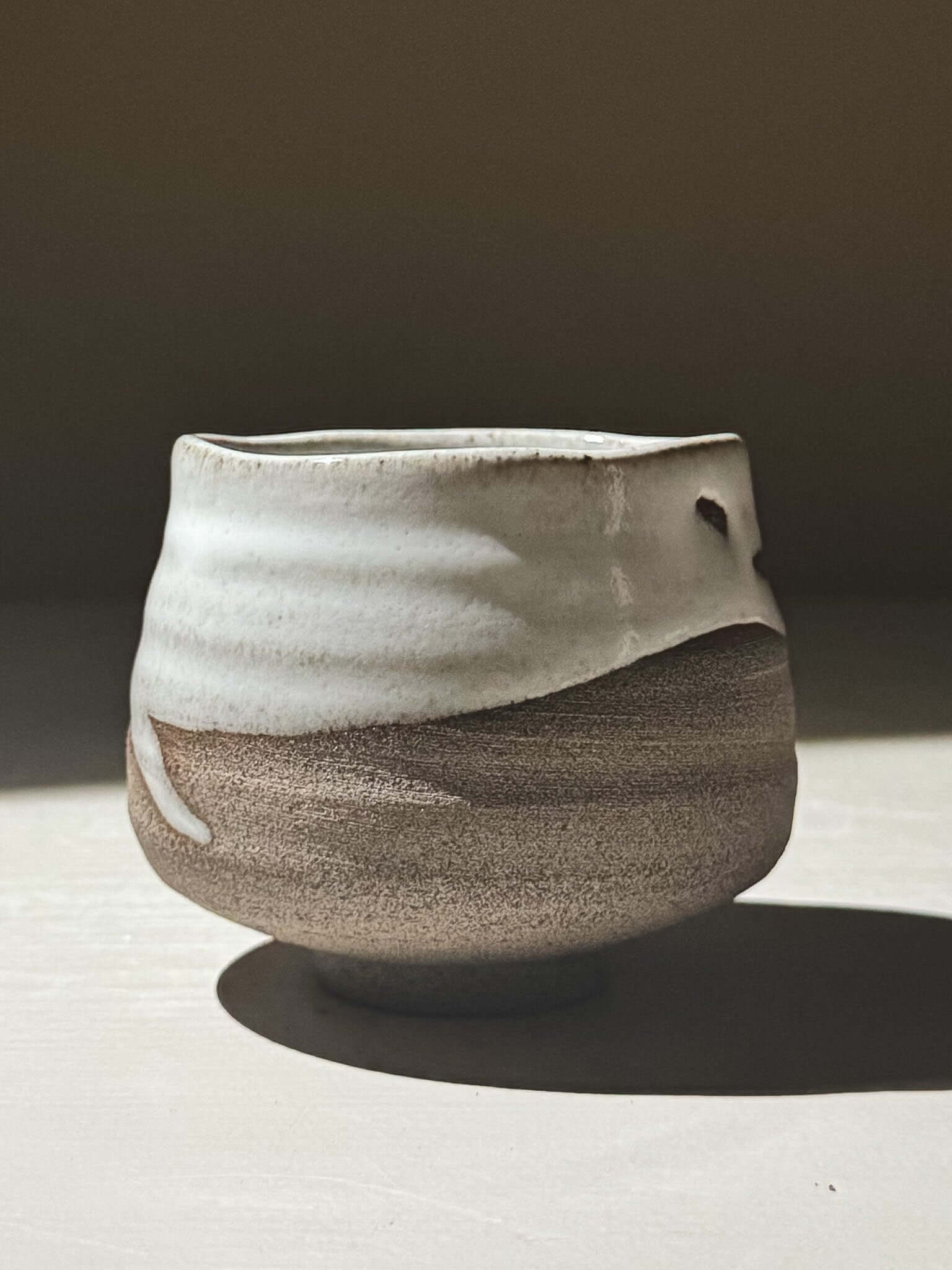 Yunomi Cup - Yuki Ash #03 featuring a glossy white glaze on a textured ash-grey stoneware body.