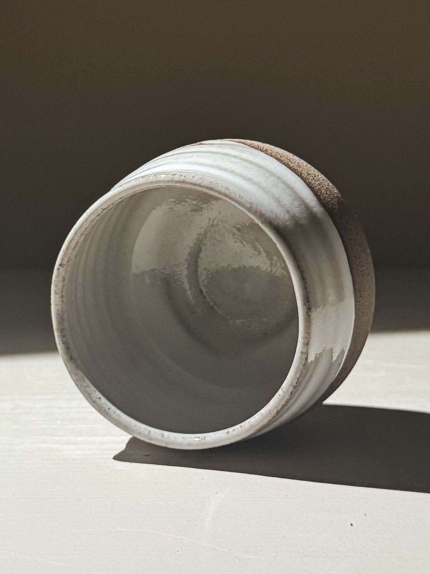 Yunomi Cup - Yuki Ash #03 showcasing glossy white glaze and textured clay, handmade stoneware.