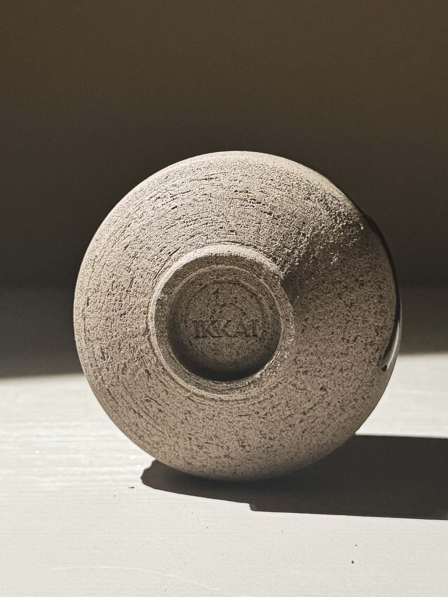 Yunomi Cup - Kuro Ash #01 bottom view showcasing natural texture and handcrafted details.