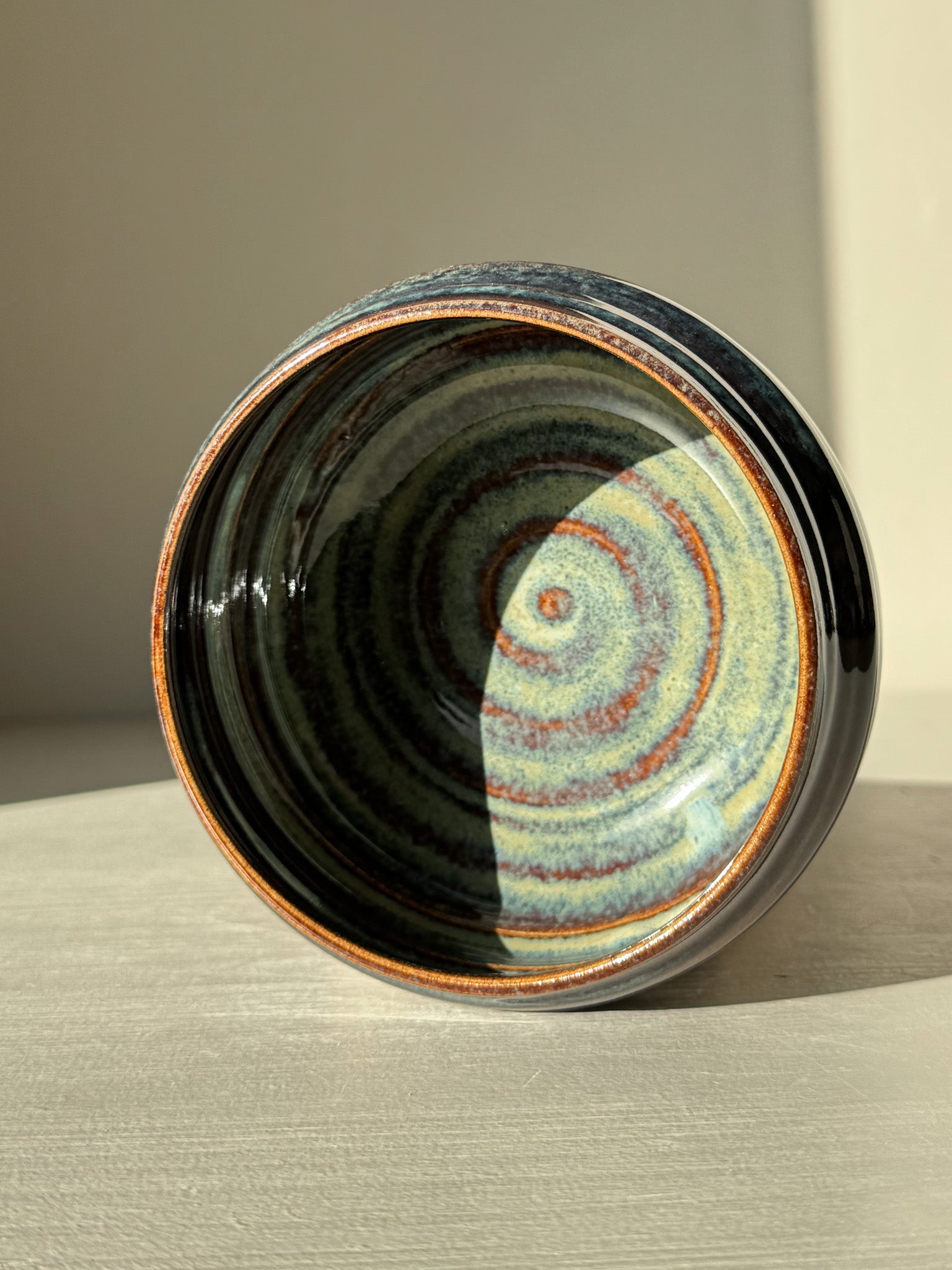 Matcha Bowl - Glossy Blue #02 with swirling earthy tones and unique curves, crafted with a soft texture and a raised foot.