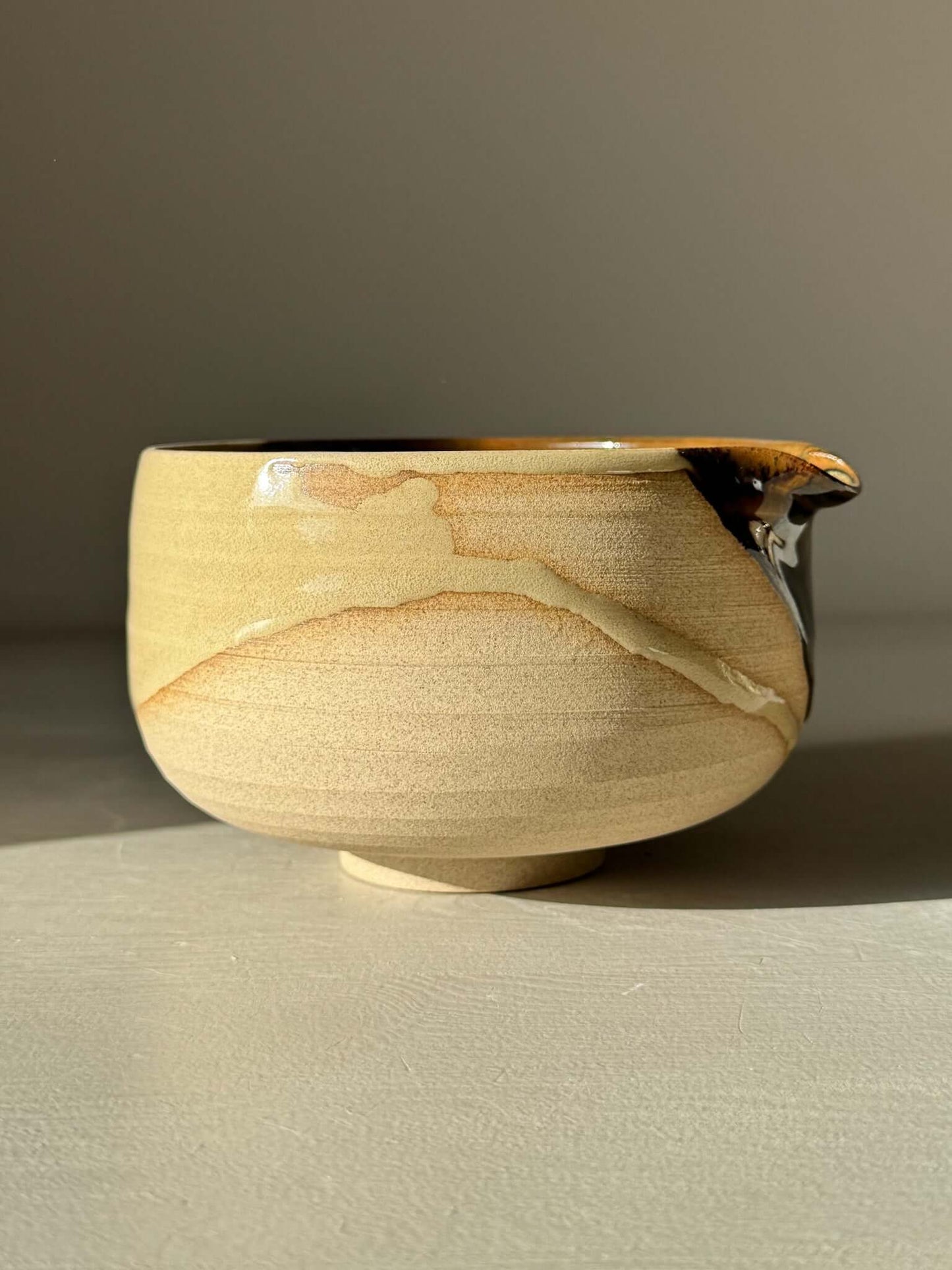 Matcha Bowl with Spout – Inyo #01 featuring unique glazes on warm stoneware, handmade and wheel-thrown.