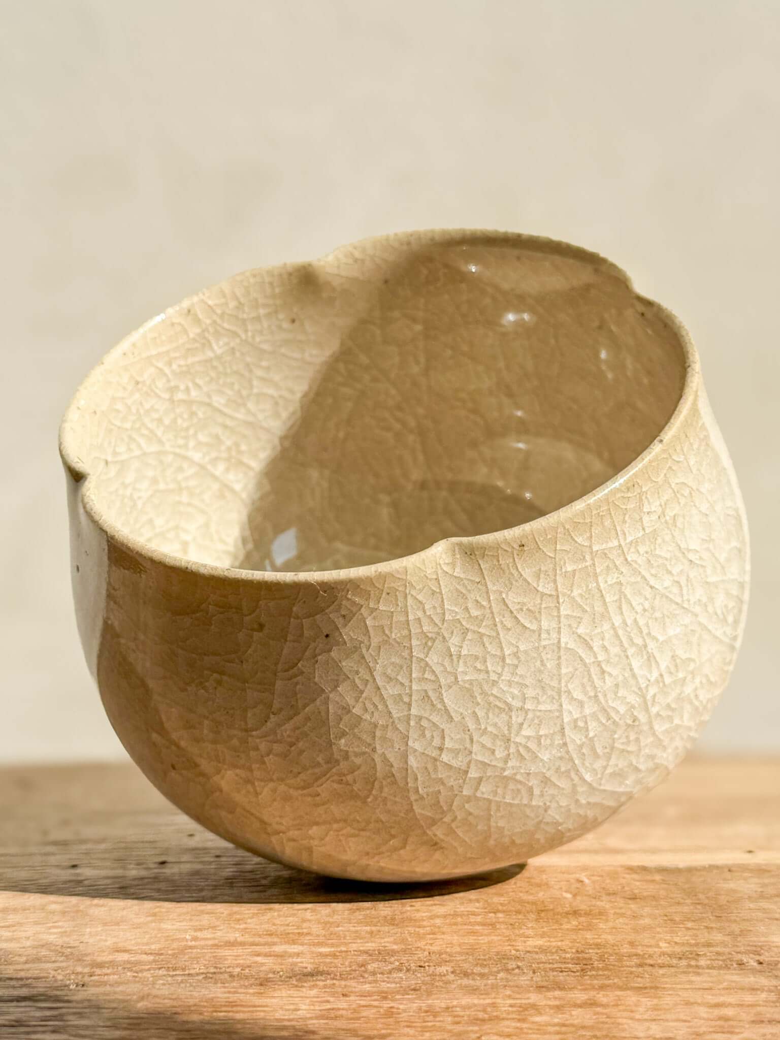 Yunomi Cup from Kannyū Series #01, featuring a transparent crackle glaze with fine lines, showcasing elegant craftsmanship.