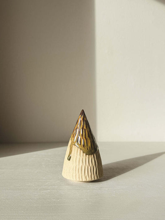 "Carved Ceramic Tree – Inyo #02 with glossy tenmoku glaze, showcasing hand-carved textures and minimalistic design in sunlight."