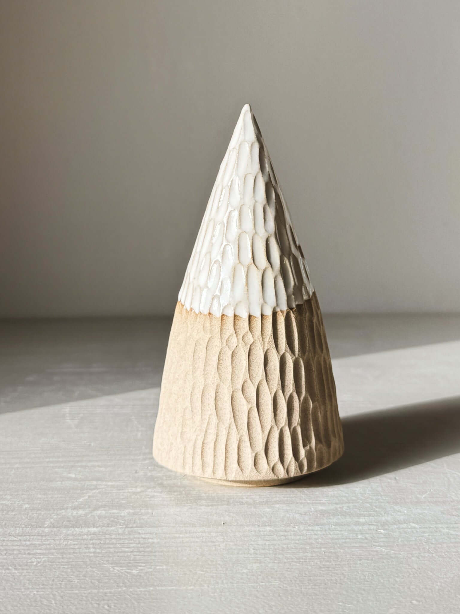 Carved Ceramic Tree – Yuki #02 in soft light, showcasing intricate hand-carved patterns and white glaze for minimalist decor.
