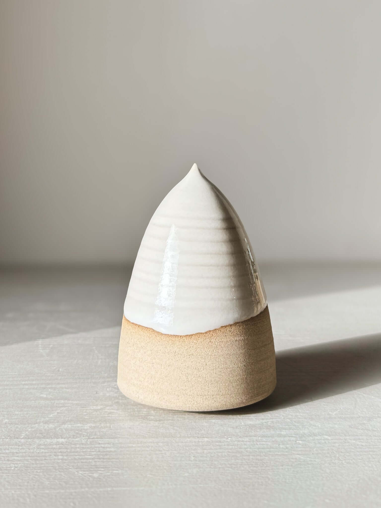 Ceramic Christmas Tree – Yuki #03 with glossy white glaze and minimal design on warm clay, handcrafted and wheel thrown.