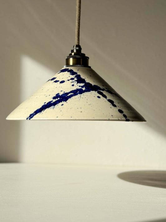 Handmade ceramic lamp shade with cobalt blue splashes from the Gosu Series #06, featuring a glossy finish and unique design.