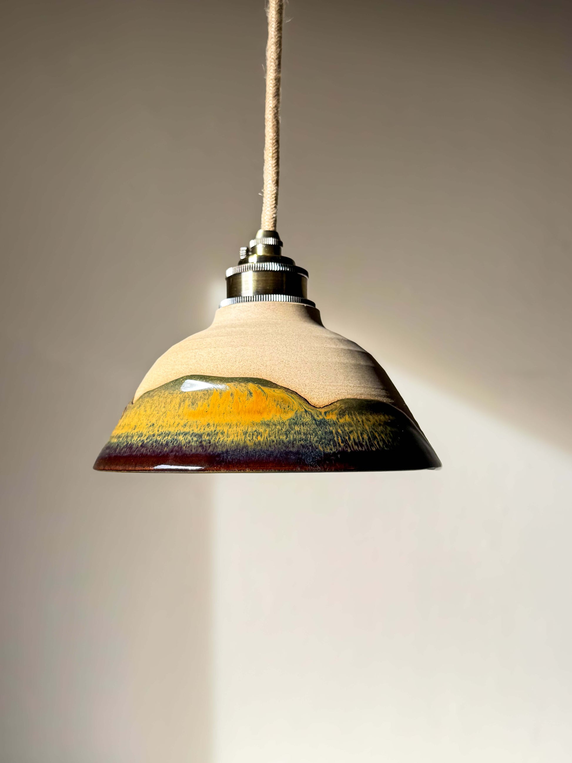 Ceramic Lamp Shade – Inyo #01, handmade ceramic with glossy glaze and rich tones, displaying natural surface with flowing glaze drips.