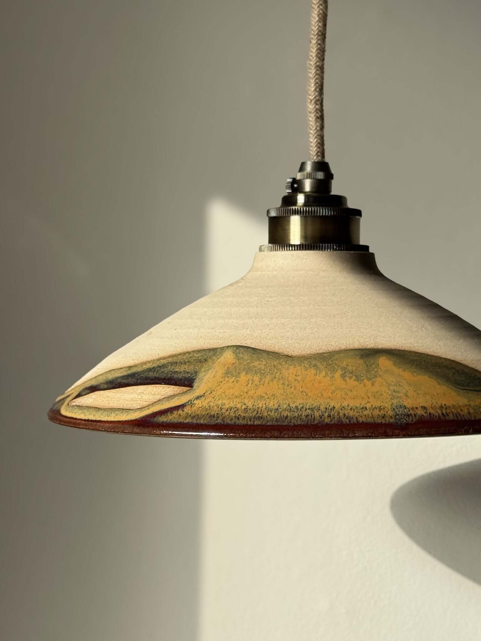 Ceramic Lamp Shade – Inyo #02 with handmade ceramic design, featuring natural colors and glossy glaze details.