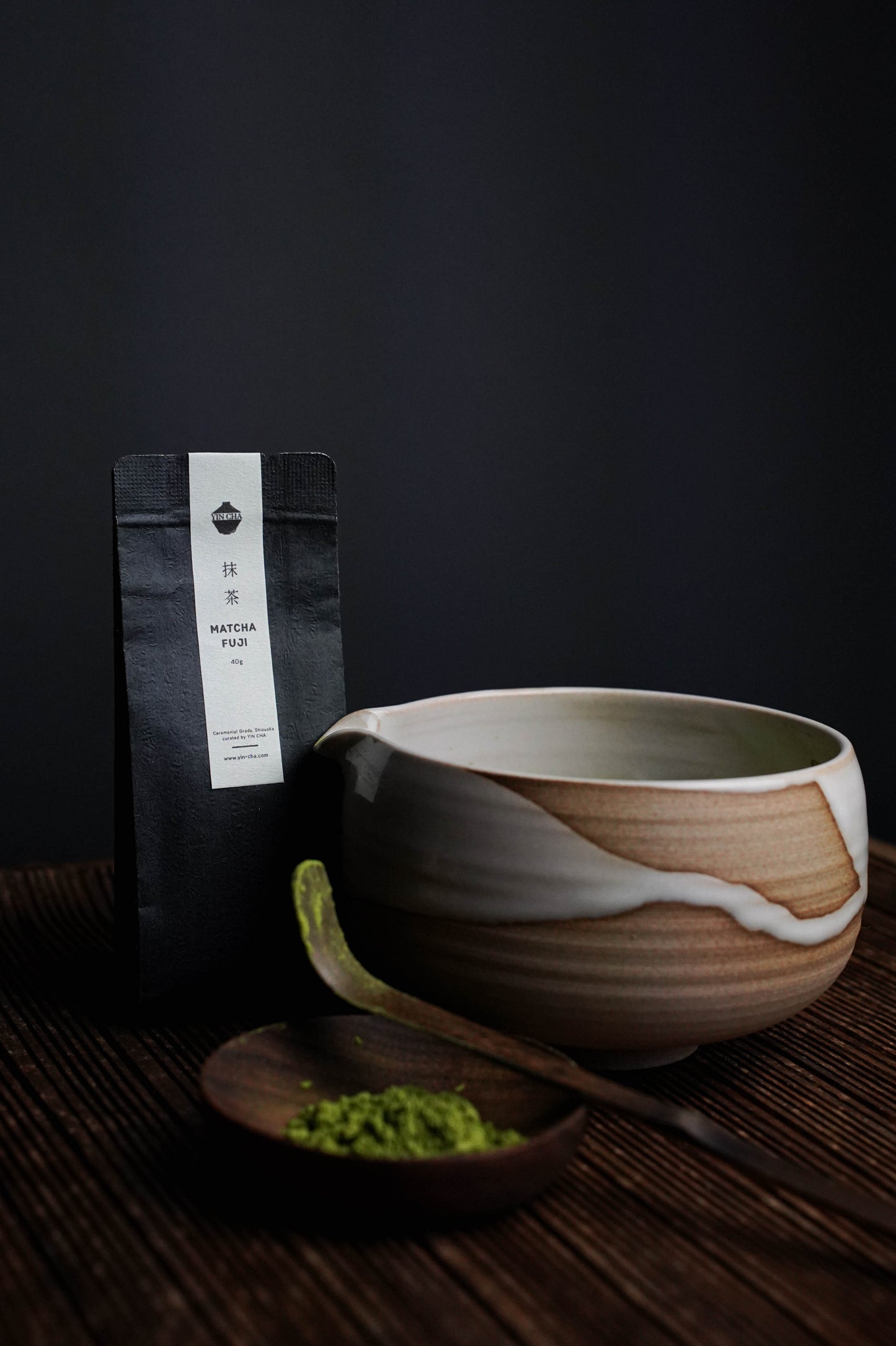 Ceremonial bowl and Fuji Matcha – Japan (Ceremonial Grade) packet with matcha powder on spoon