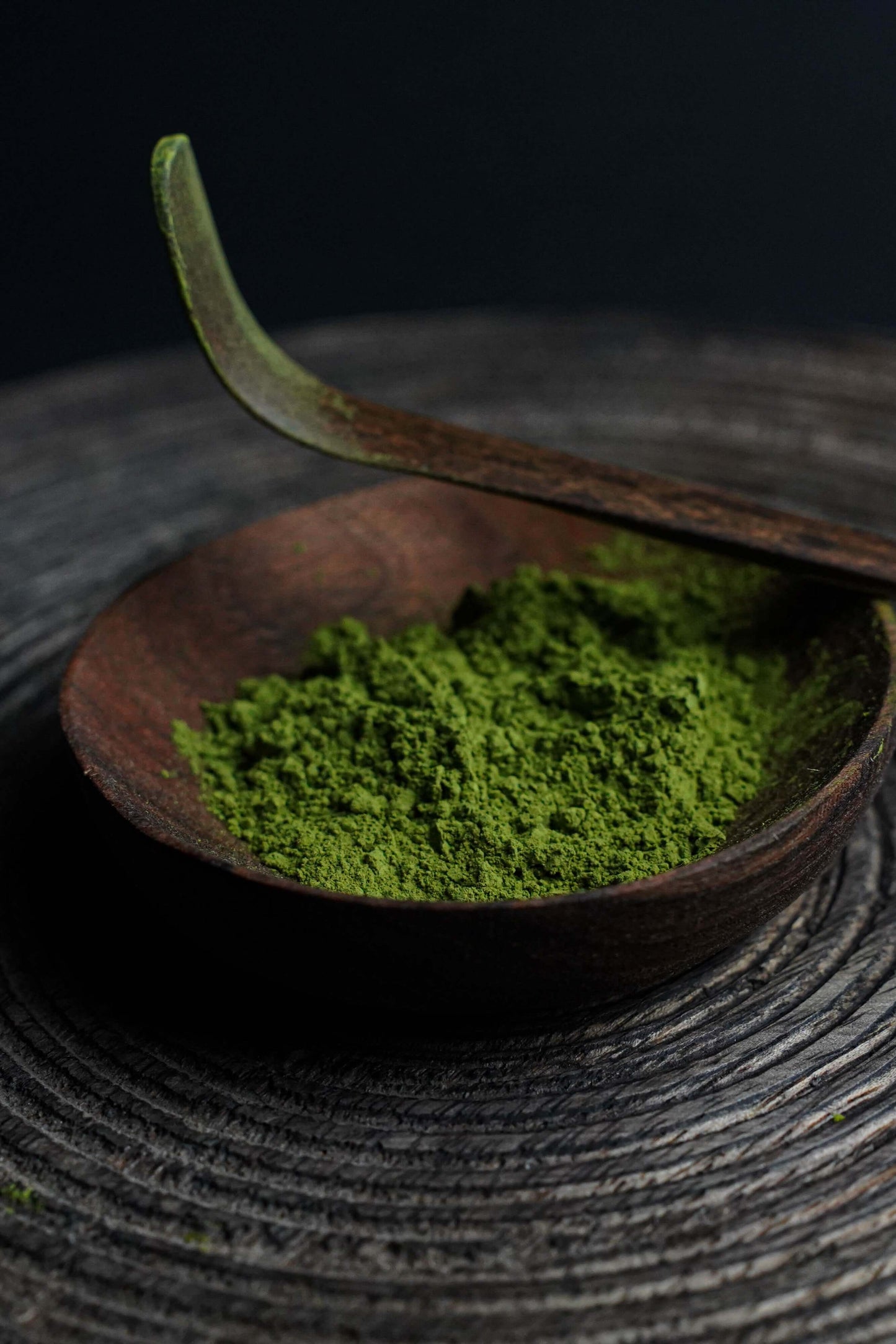 Fuji Matcha – Japan (Ceremonial Grade) in wooden bowl with bamboo scoop, highlighting organic, vibrant green matcha powder from Shizuoka.