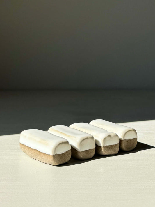 Yuki Series chopstick and matcha spoon rests with white glaze over toffee clay, minimalist design.