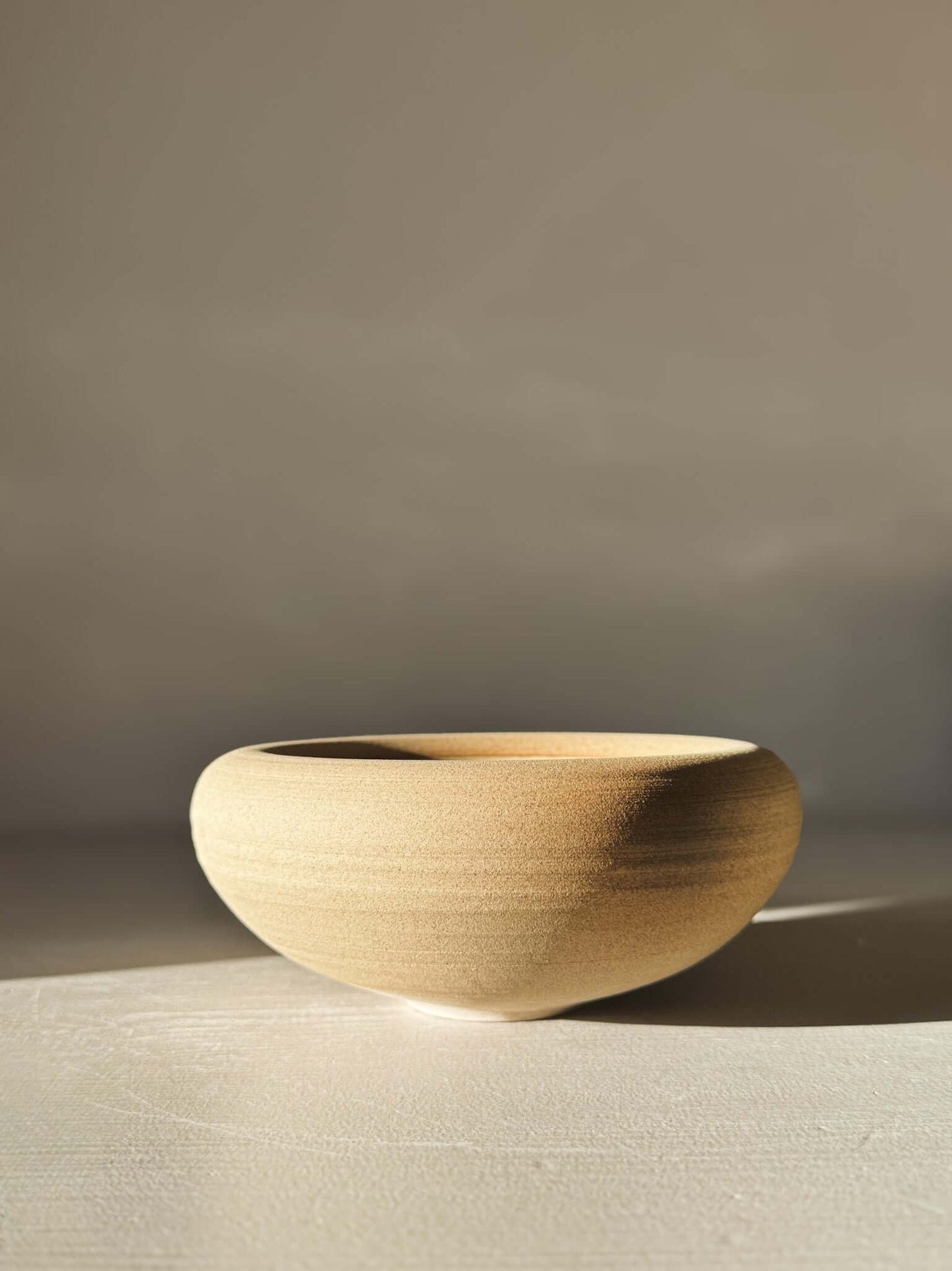 Double-Walled Bowl - Inyo #01 with raw toffee-toned clay exterior, perfect for modern table settings.