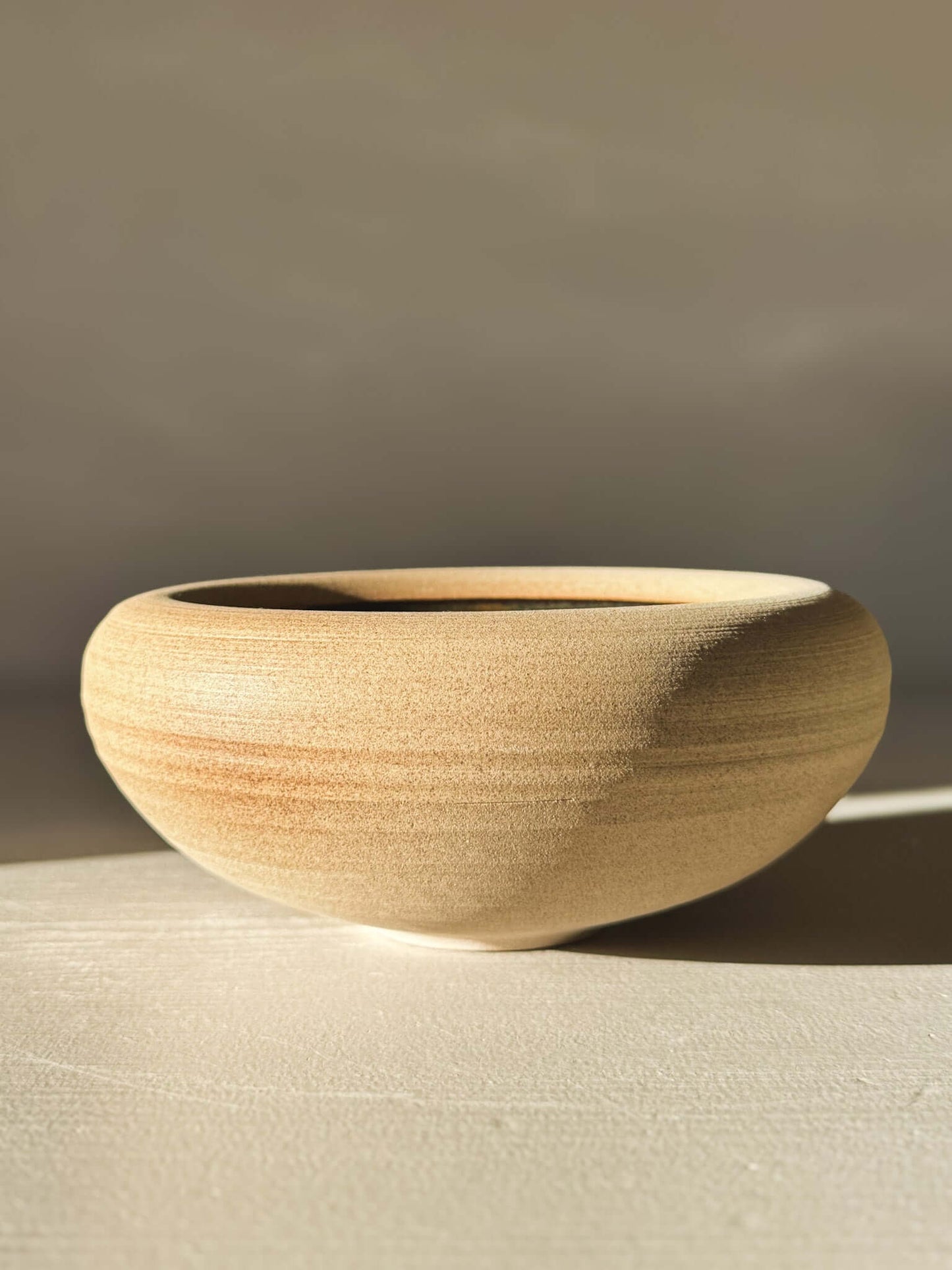 Double-Walled Bowl - Inyo #01 with raw toffee-toned clay and gentle throwing lines, part of Inyo Series with unique glaze colors.