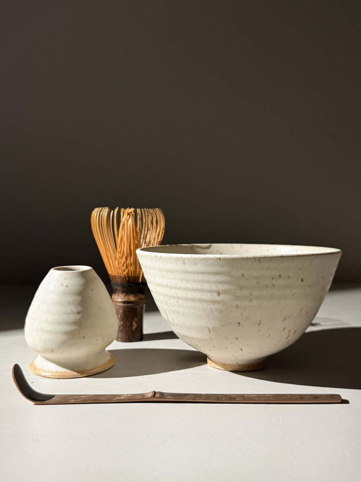 Matcha Bowl & Whisk Holder Set - Eggshell #03 with speckled stoneware in soft matte eggshell glaze, displaying understated elegance.