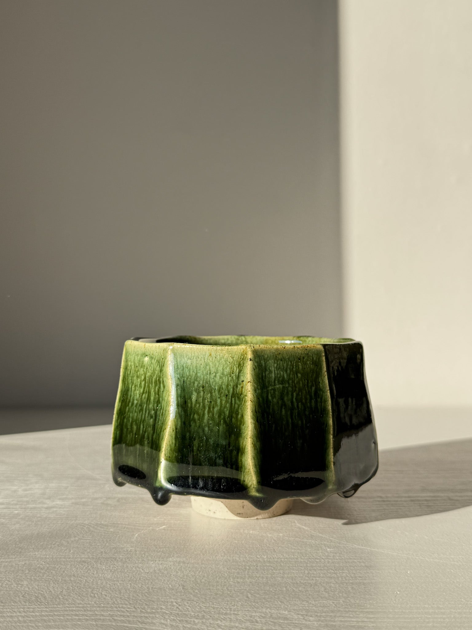 Faceted Matcha Bowl - Hinoki #02 with deep green glaze and hand-carved facets, part of the Hinoki Series, flared rim and lifted foot design.