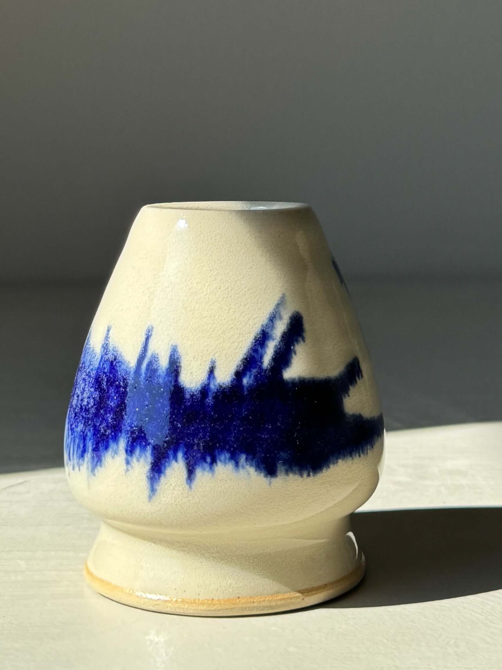 Gosu Matcha Whisk Holder close up with bold cobalt blue handmade design