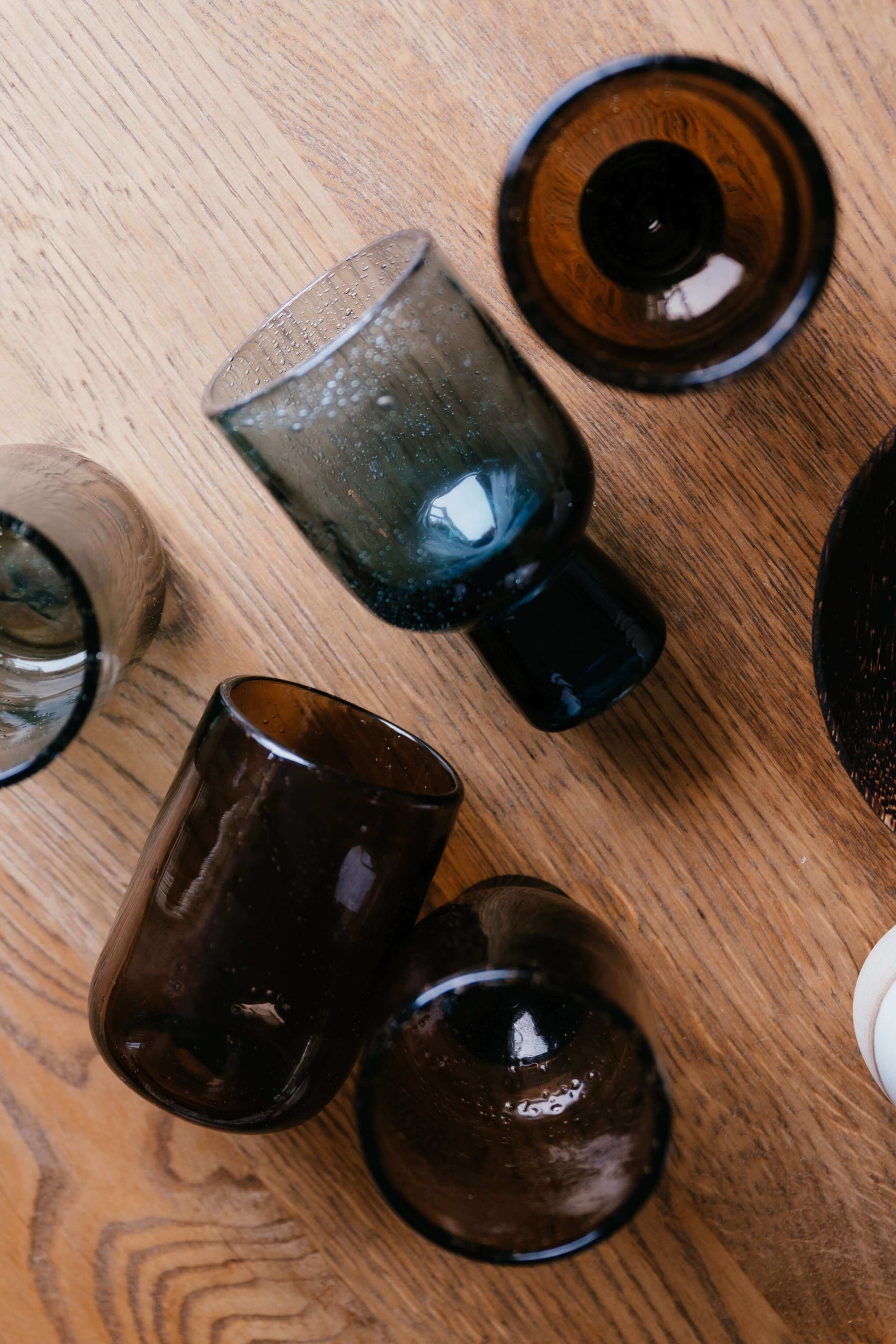 Grey Pedestal Glass – Natural Bubbled Glass with handmade ceramic style on a wooden surface.