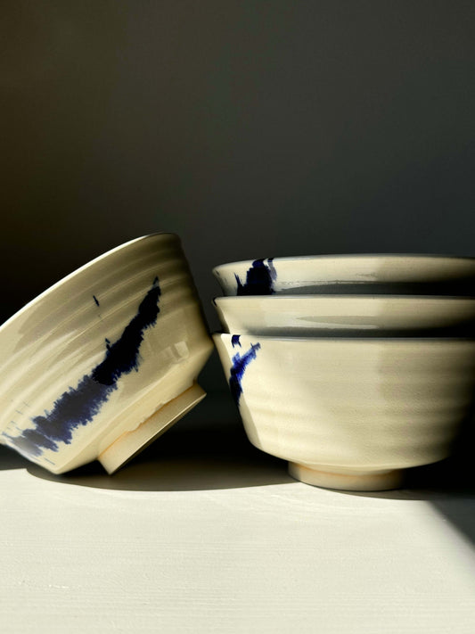 Handcrafted Gosu Series ramen bowls with bold cobalt blue splashes beneath a clear glaze, perfect for noodles and soups.