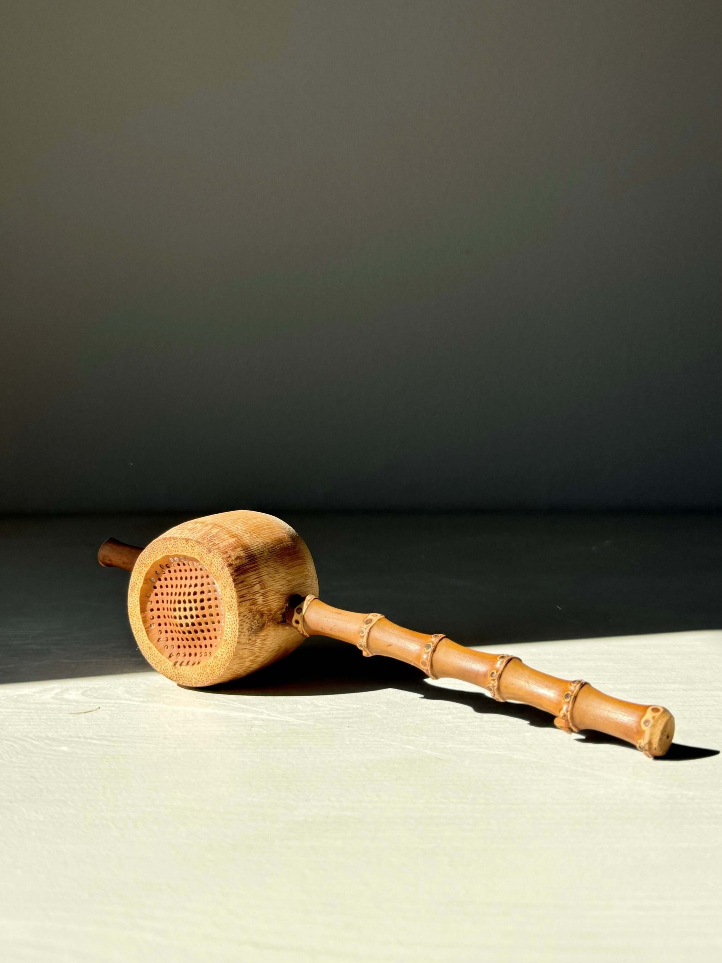 Bamboo Tea Strainer with rustic charm, perfect for handmade ceramic mugs. Lightweight, durable, and easy to balance on cups.