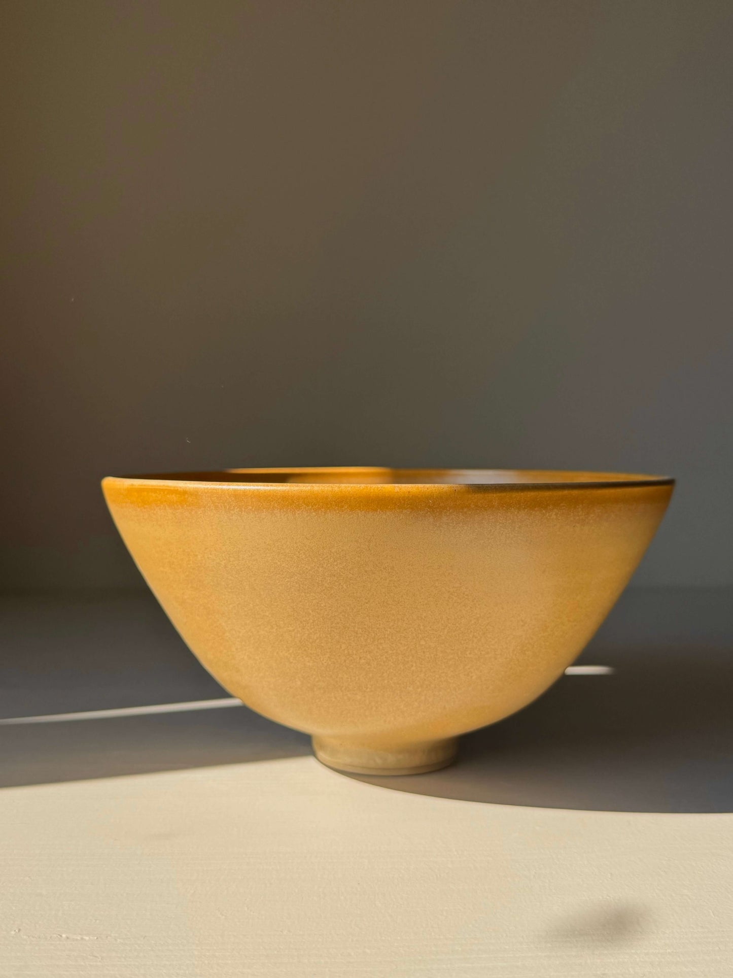 Handmade ceramic Bowl - Golden Yellow #01 with satin glaze and gently sloping sides, medium-sized, perfect for daily use or special occasions.