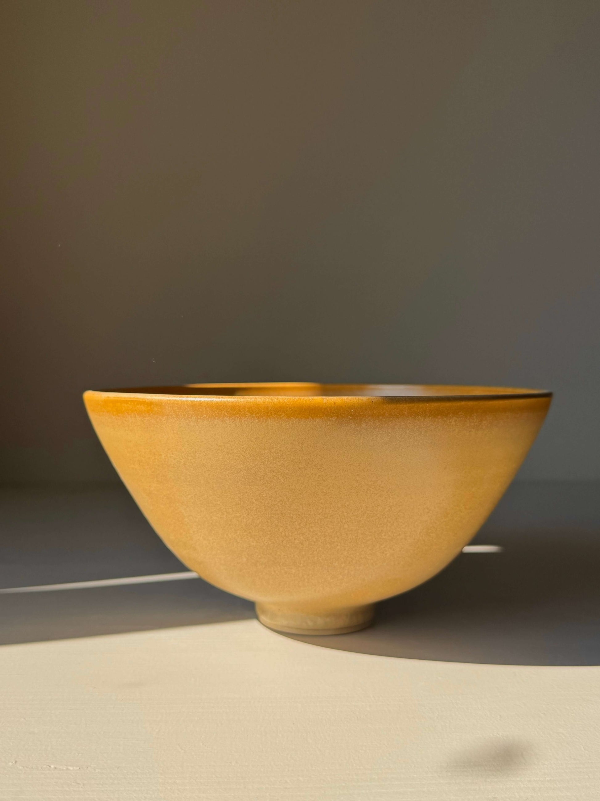 Handmade ceramic Bowl - Golden Yellow #01 with satin glaze and gently sloping sides, medium-sized, perfect for daily use or special occasions.