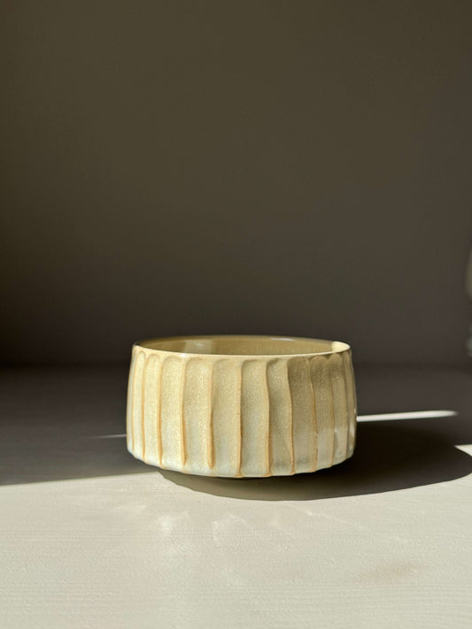 Carved Matcha Bowl – Moonstone Glaze #01 handmade ceramic with hand-cut ridges and pale glaze, reflecting minimalist design elegance.