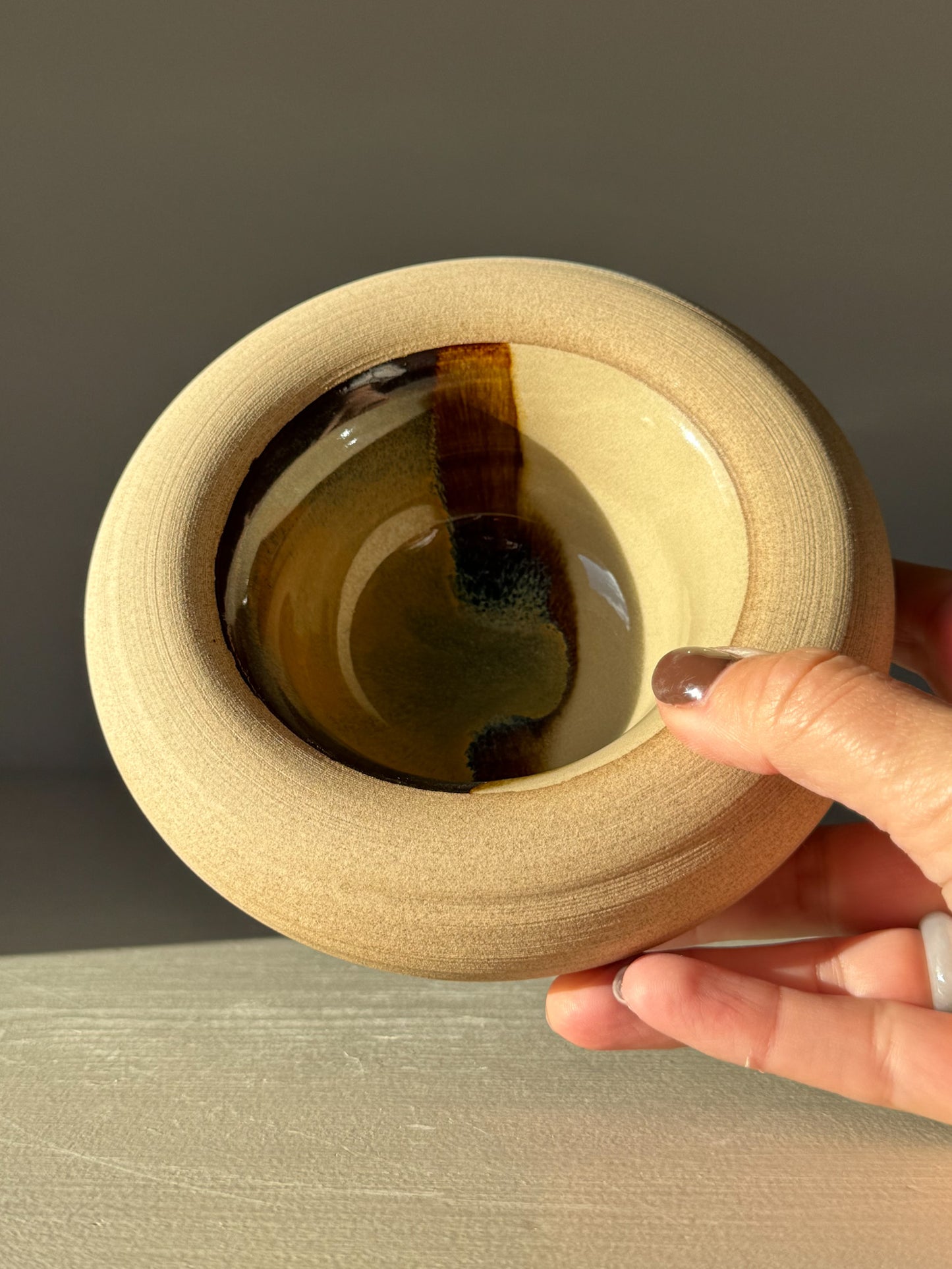 Double-Walled Bowl - Inyo #03 in toffee clay with clear and tenmoku glaze showing deep browns, golds, and blues.