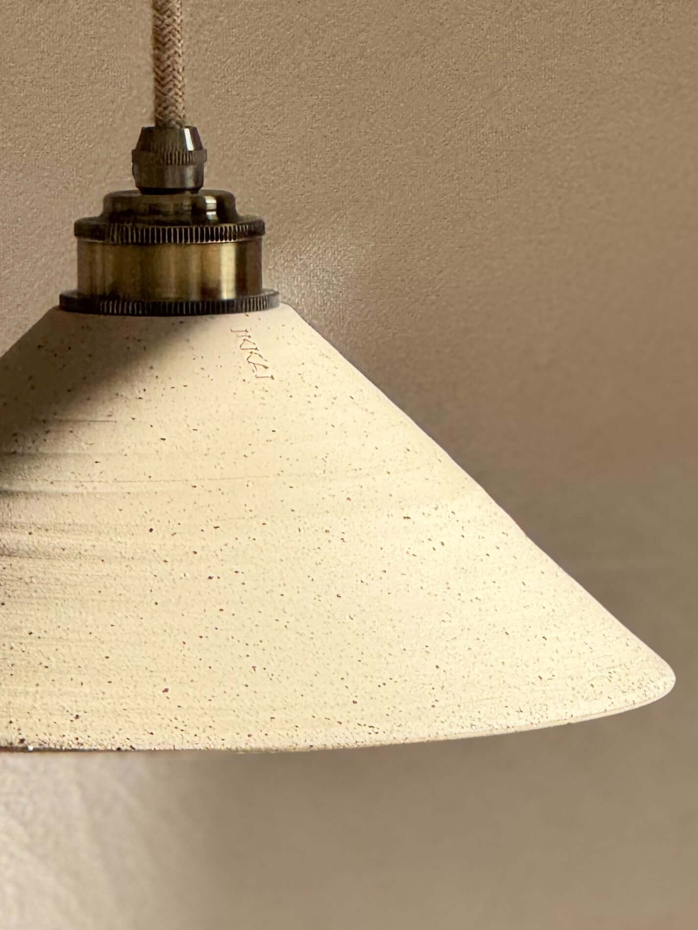 Handmade Ceramic Lamp Shade – Half Clear Glaze #01 with unglazed exterior and glazed interior for cozy lighting.