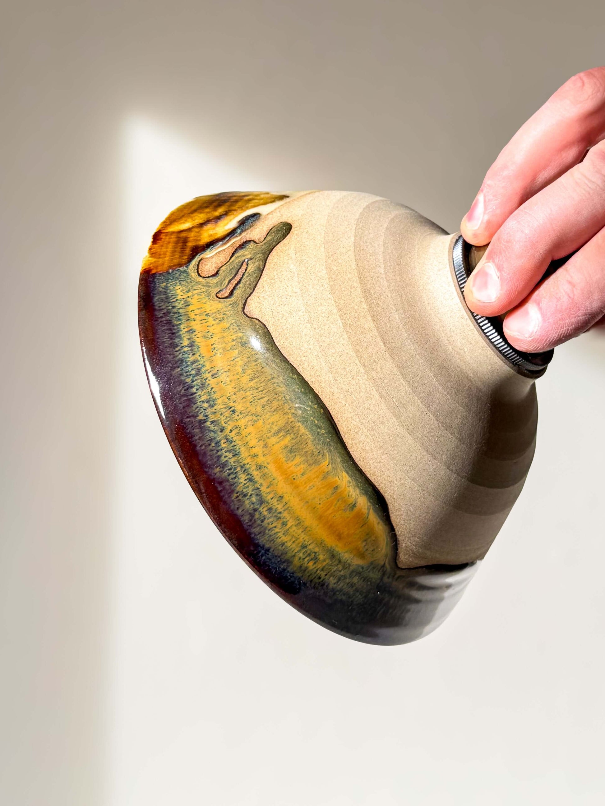 Handmade Ceramic Lamp Shade – Inyo #01 with bronze, amber, and deep blue glaze, highlighting natural flowing drips of glaze.