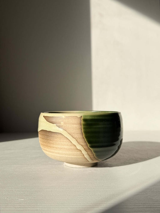 Handmade ceramic Matcha Bowl – Mori #03 with layered green and brown glazes showcasing natural stoneware texture.