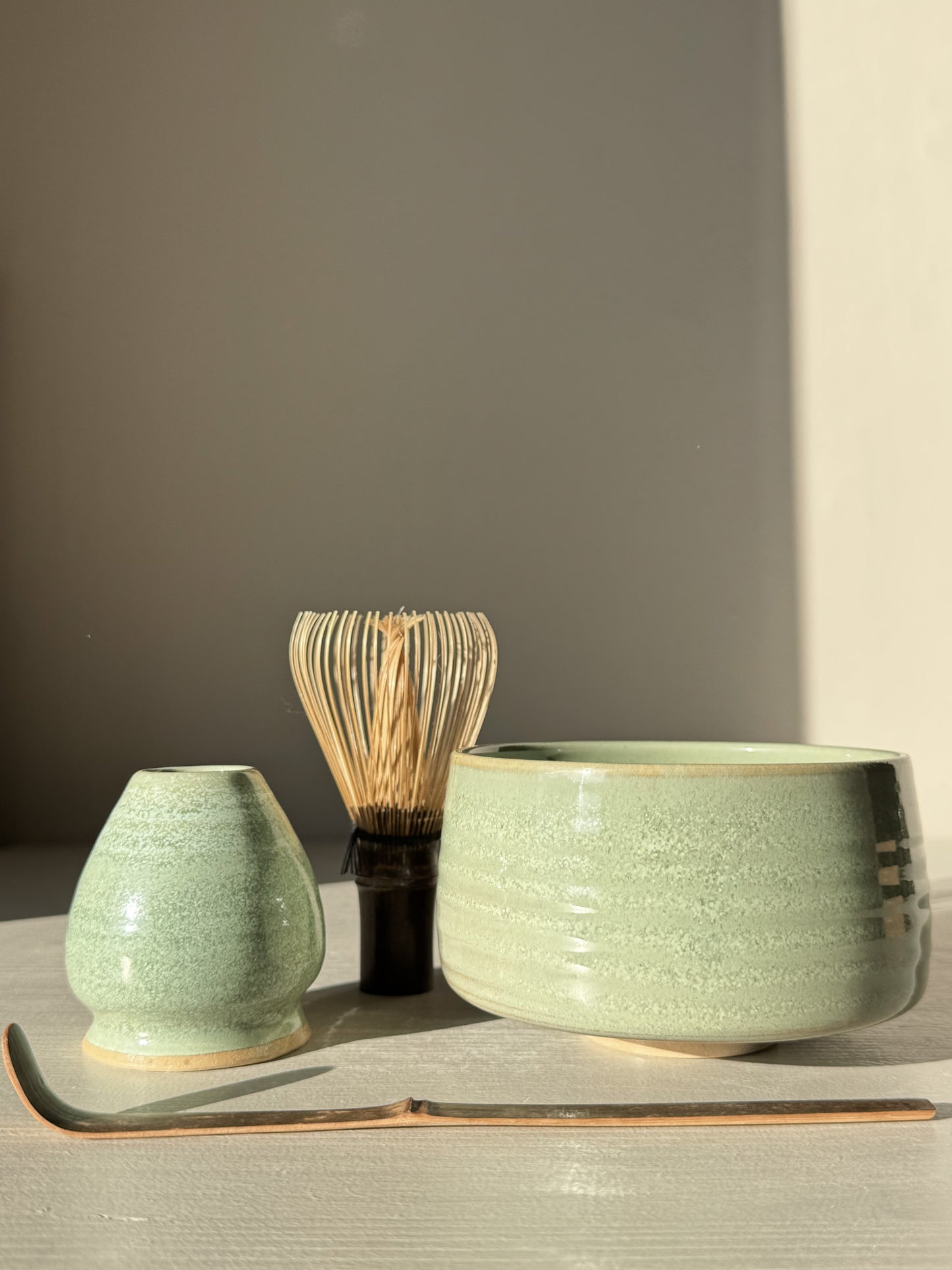 Matcha Bowl – Sage Glaze #02 with whisk and scoop in sage green, glossy handmade finish