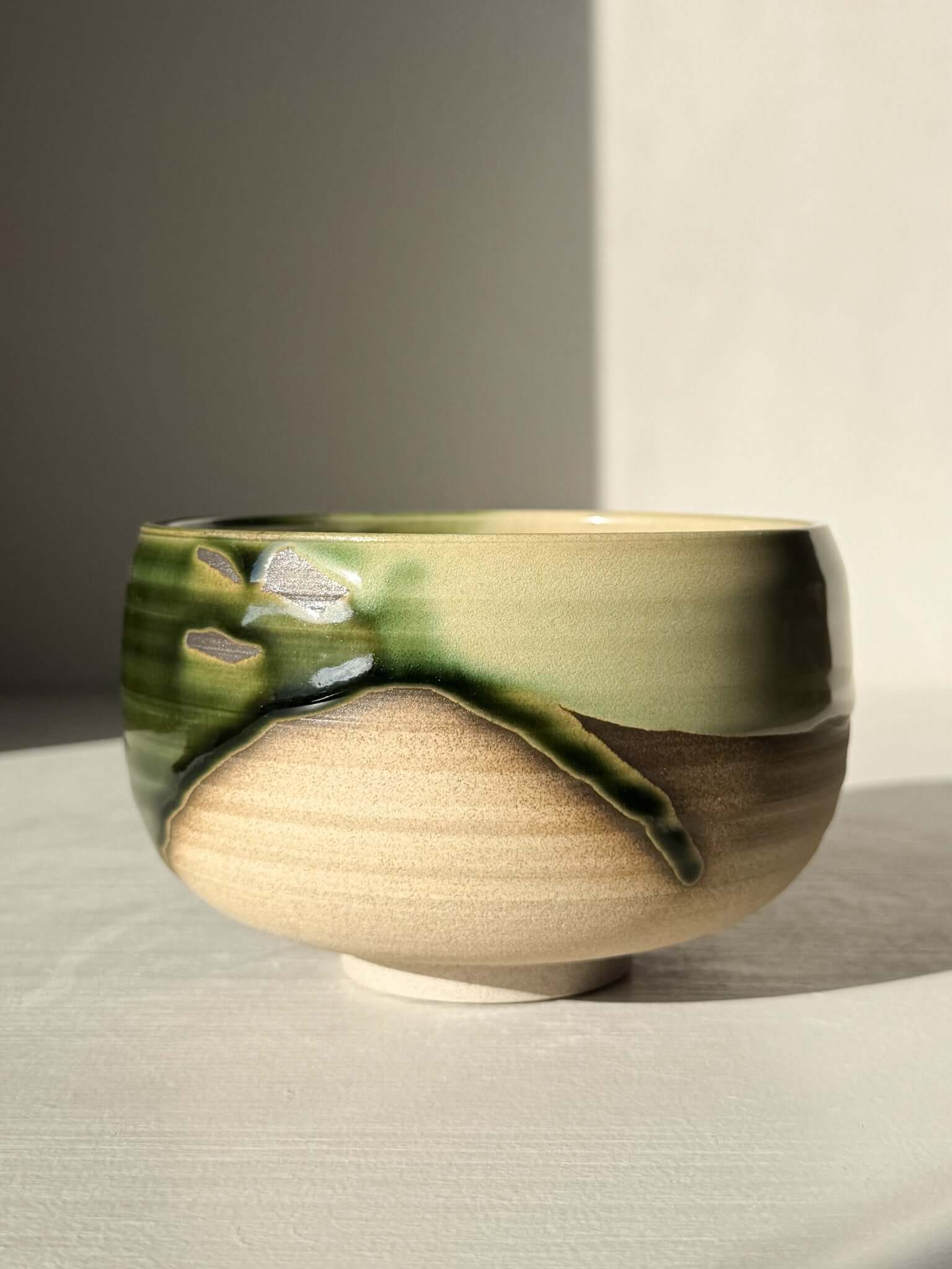 Matcha Bowl – Mori #03, handmade ceramic bowl with layered green and brown glazes, part of Mori Series, natural stoneware.