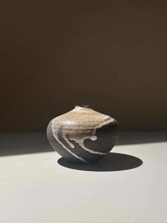 Orb Vase – Matt Clear with organic patterns and soft spherical form, showcasing unique glaze movement.